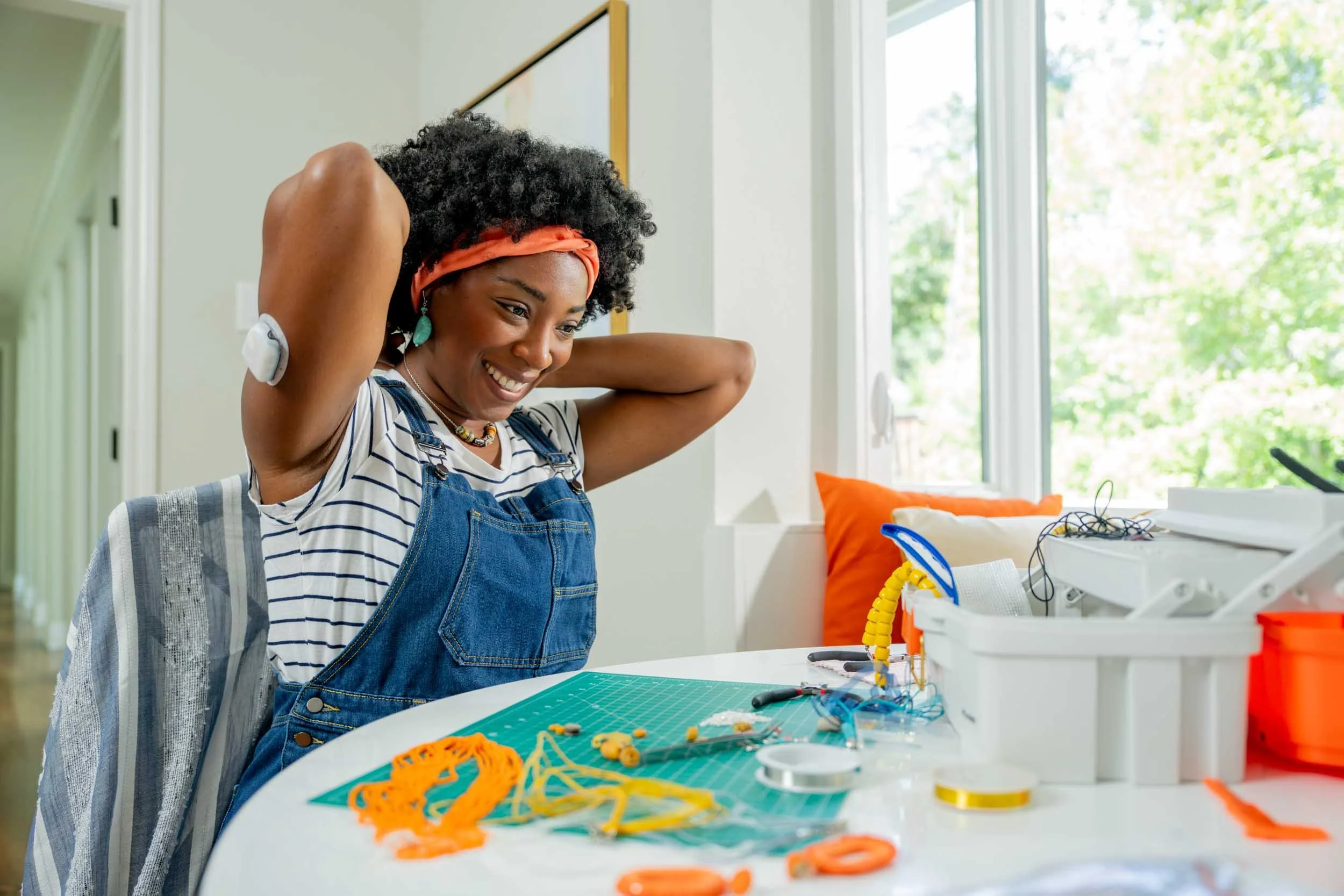 Woman-Making-Jewelry-at-Table.jpg