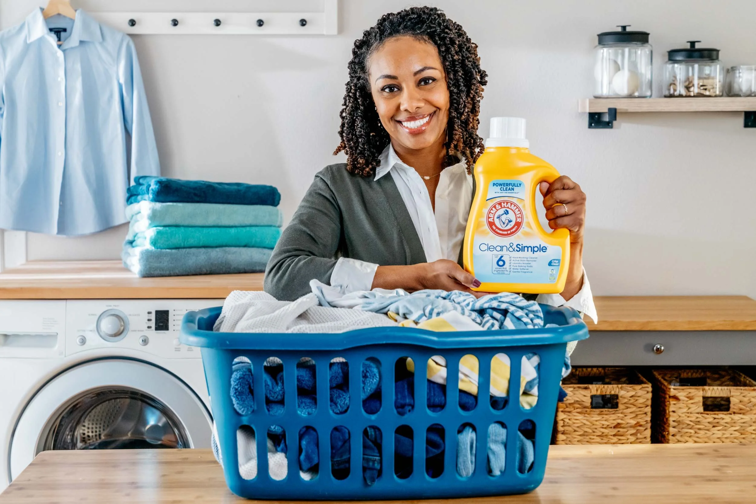 Woman-with-Arm-Hammer-Detergent-and-Laundry.jpg