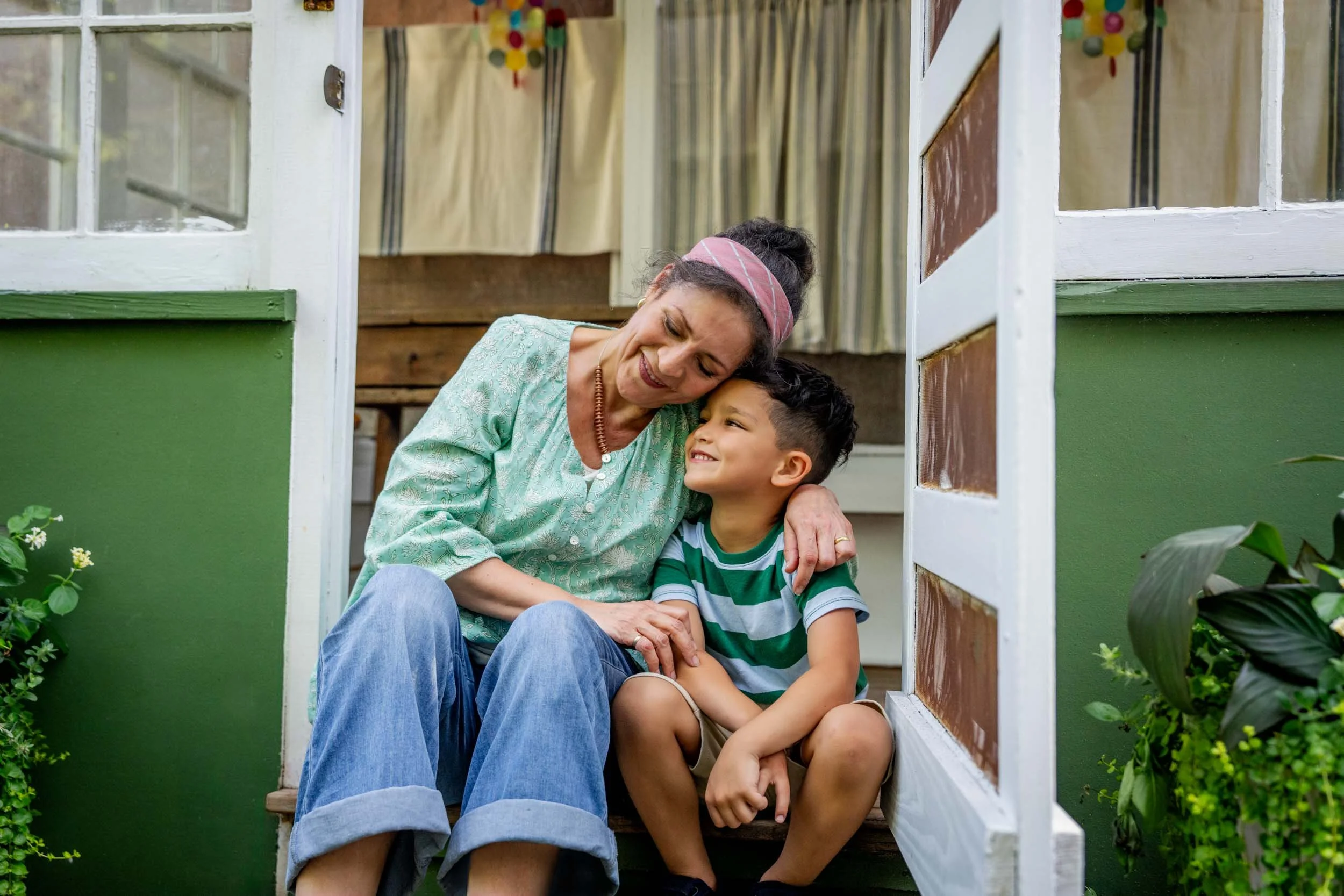 Woman-Hugging-Boy-in-Doorway.jpg