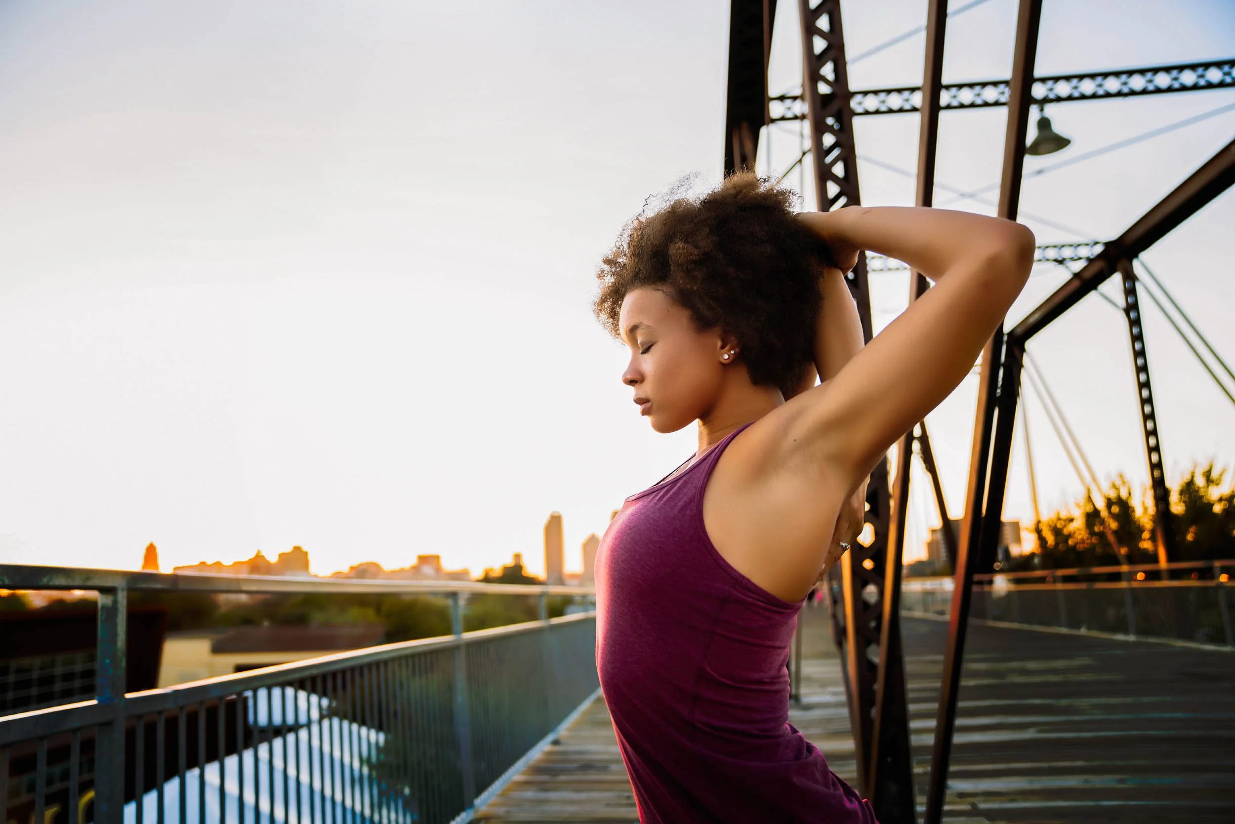 Woman-Stretching-on--Bridge.jpg