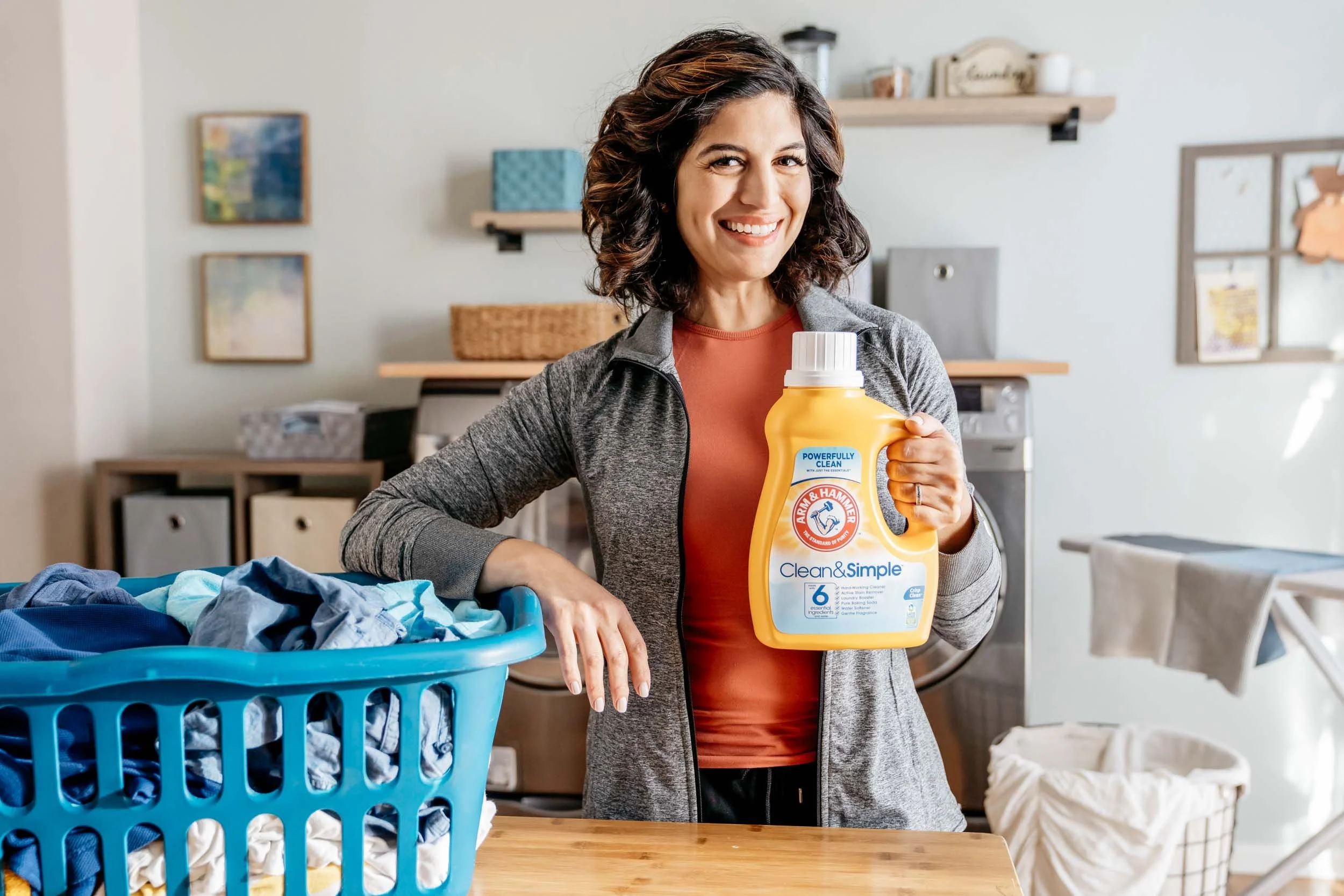 Woman-holding-laundry-detergent.jpg