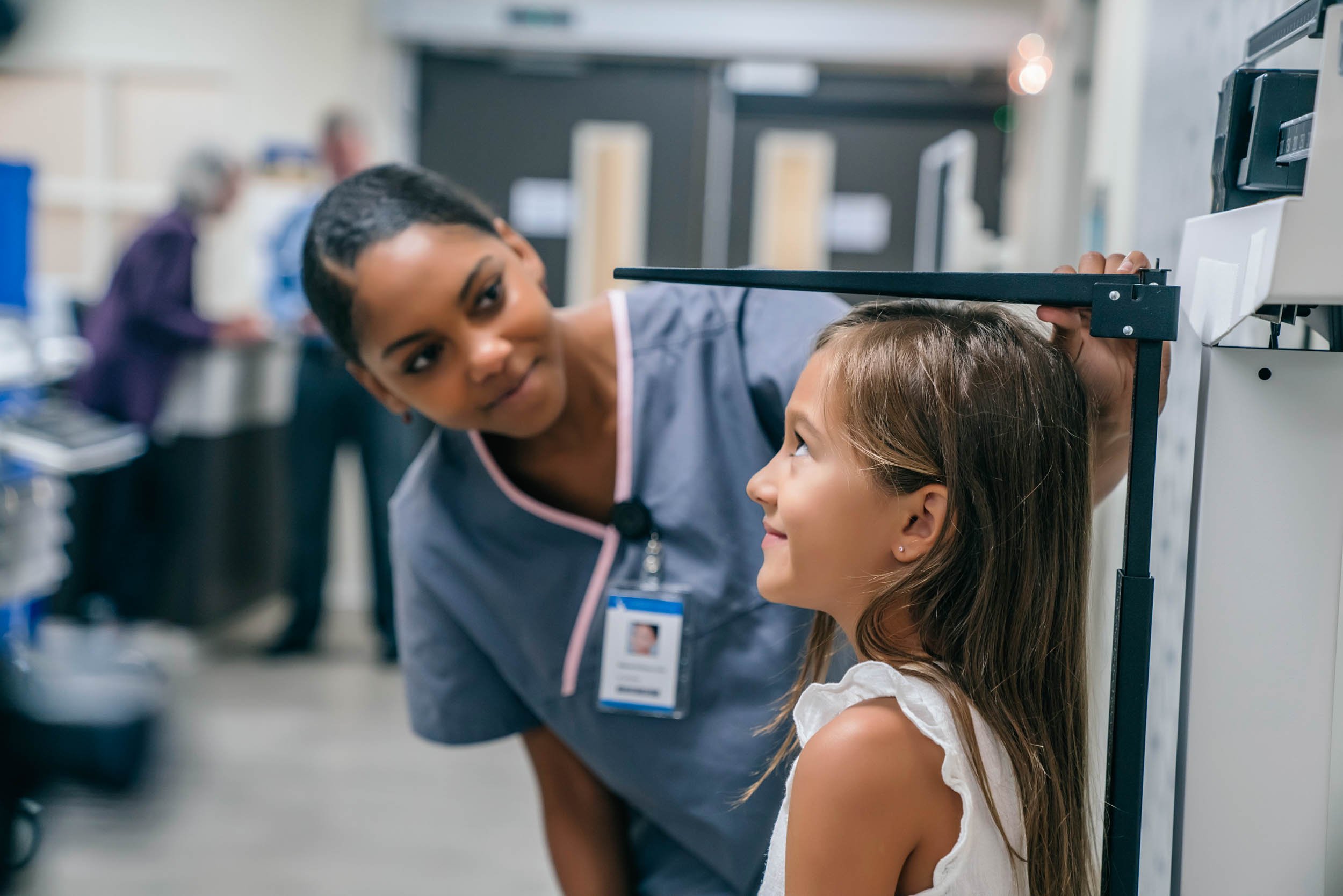 nurse-measuring-girls-height.jpg