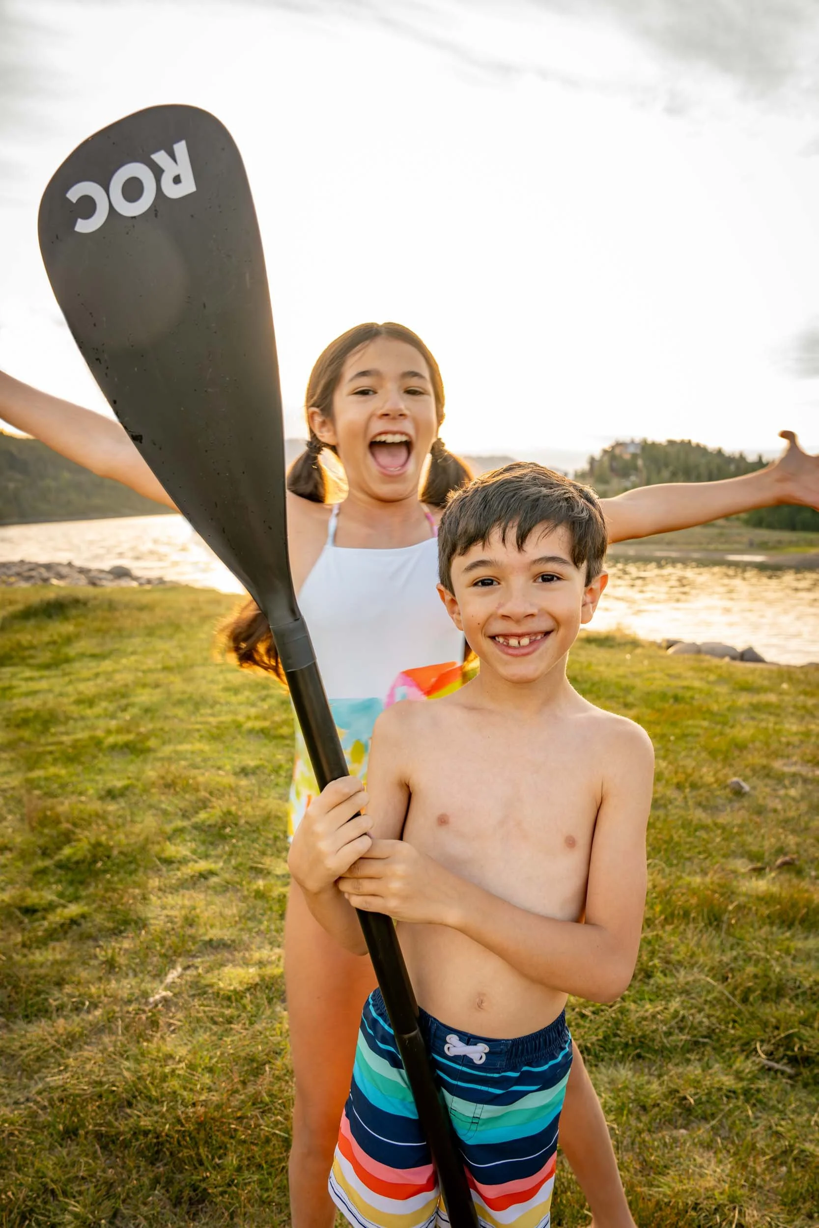 Happy-Children-with-Paddle-Outdoors.jpg