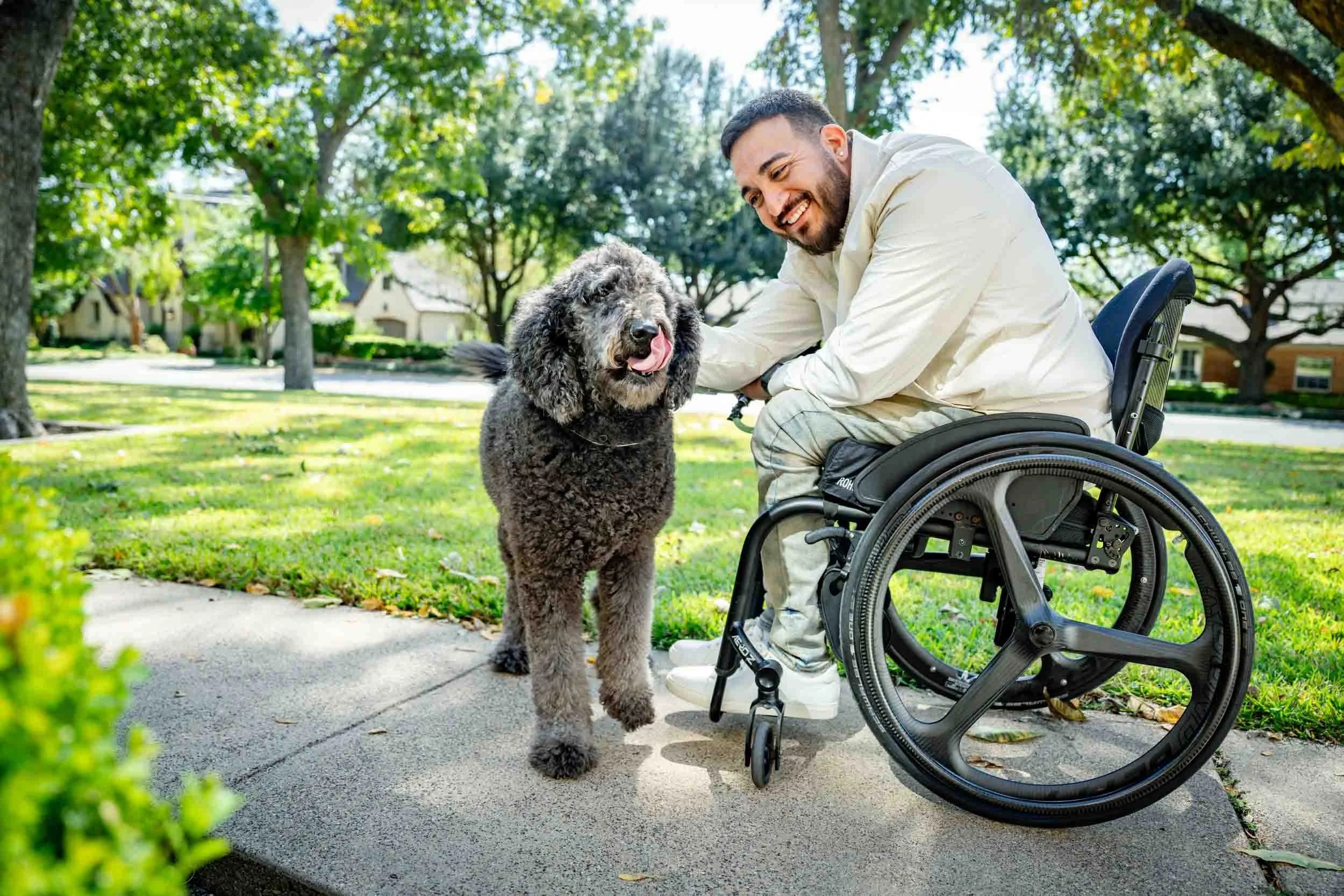 Man-in-Wheelchair-and-Dog-in-Park.jpg