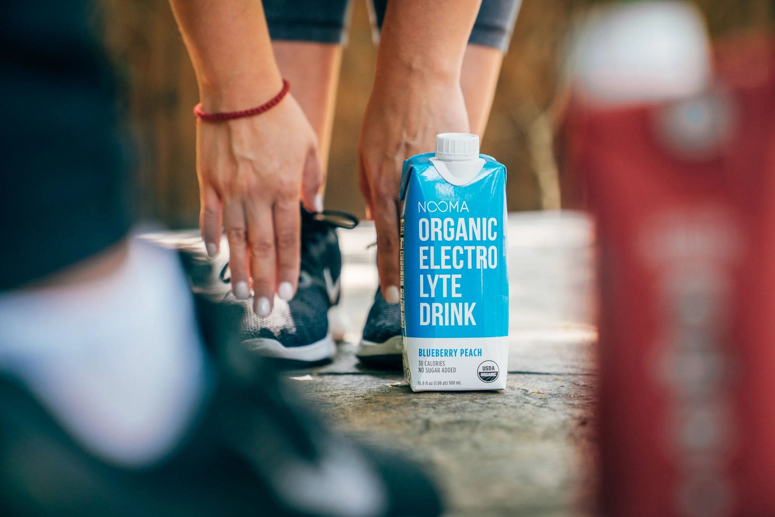 Stretching-with-Nooma-Electrolyte-Drink.jpg