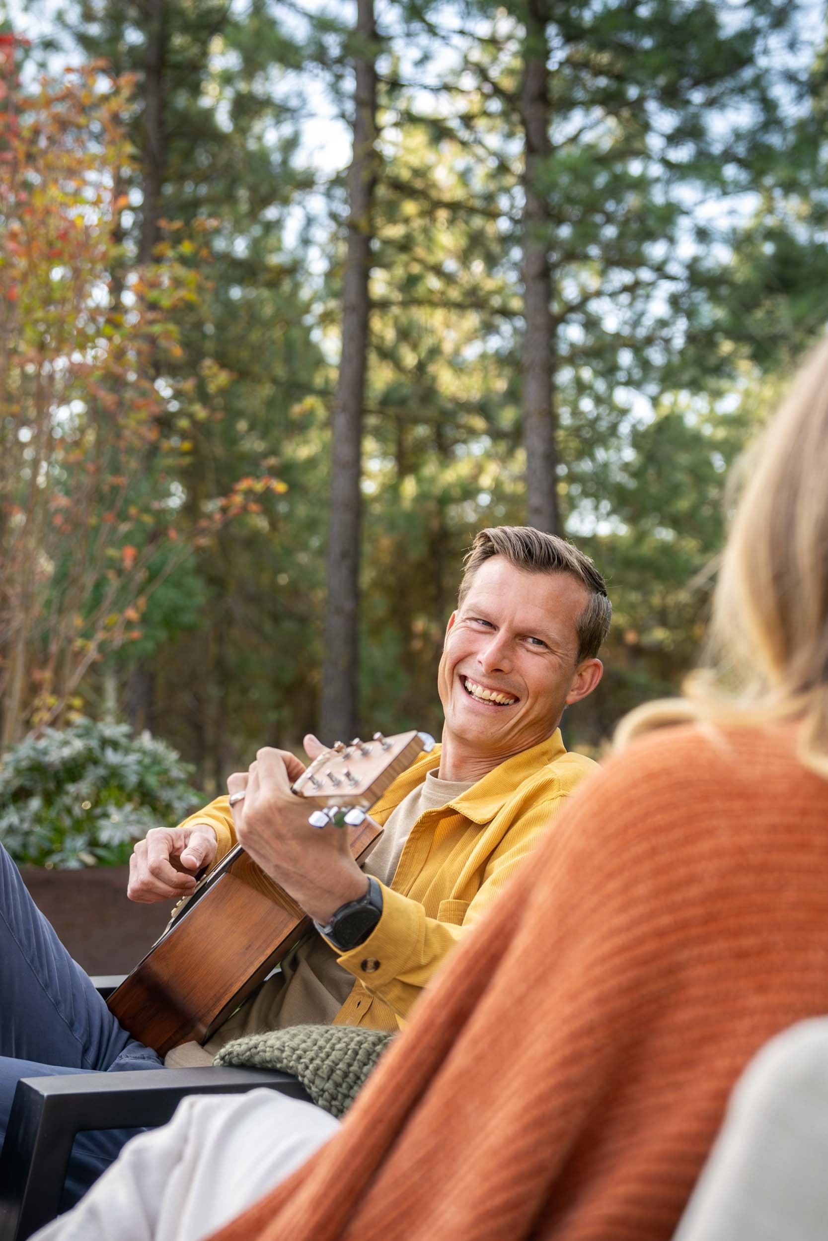 Man-Playing-Guitar-Outdoors.jpg