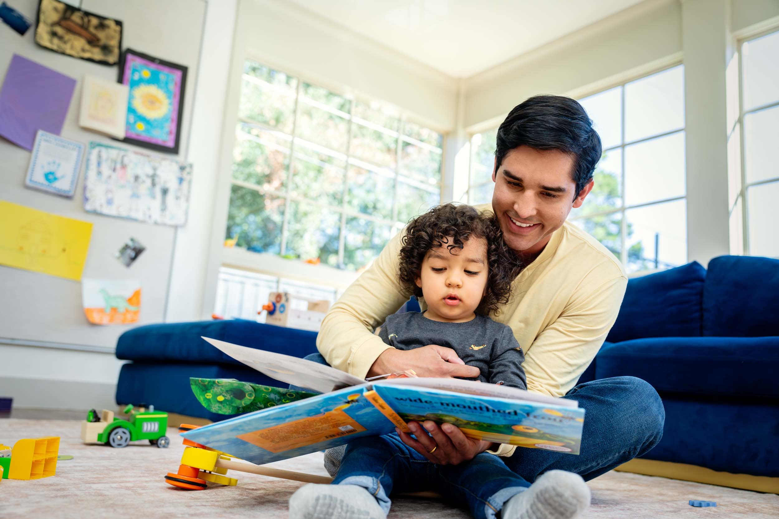 Dad-and-Son-Reading-Together-at-Home.jpg