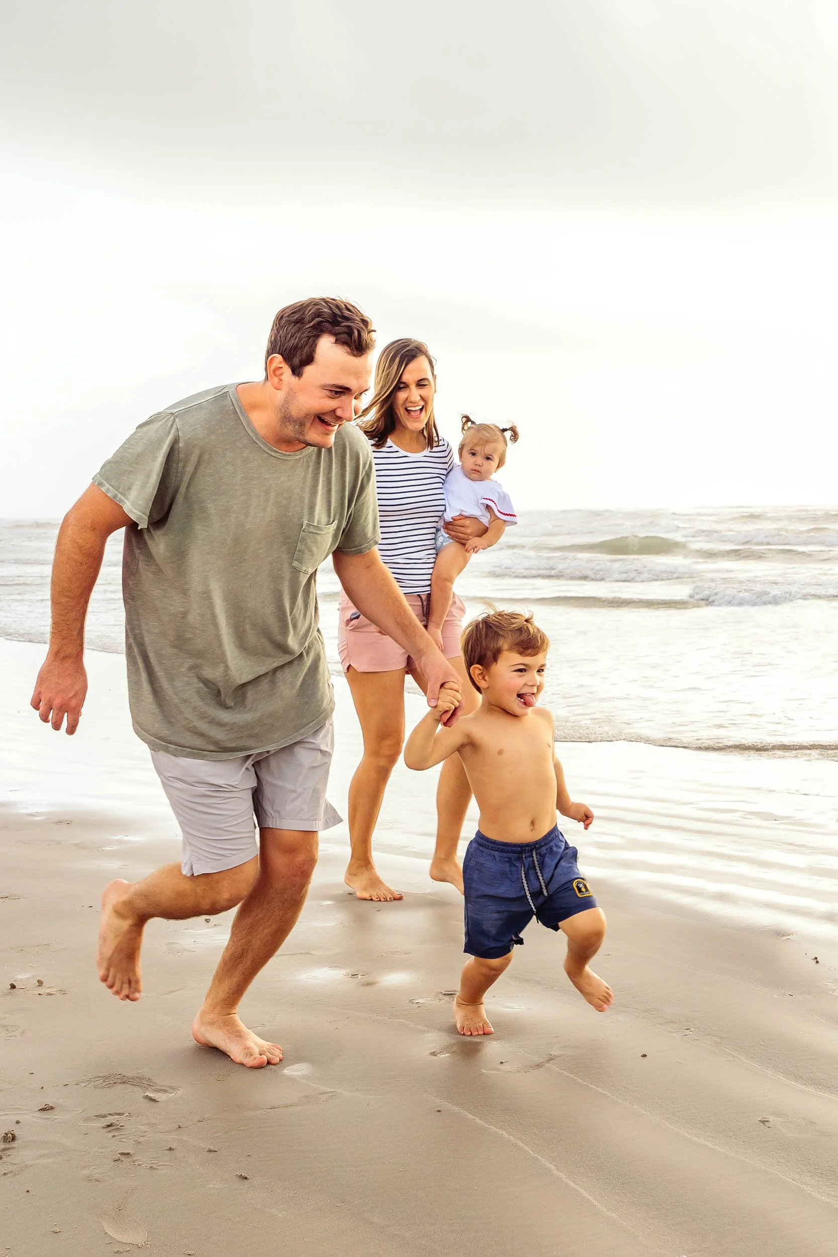 Family-Walking-on-Beach-at-Sunrise.jpg