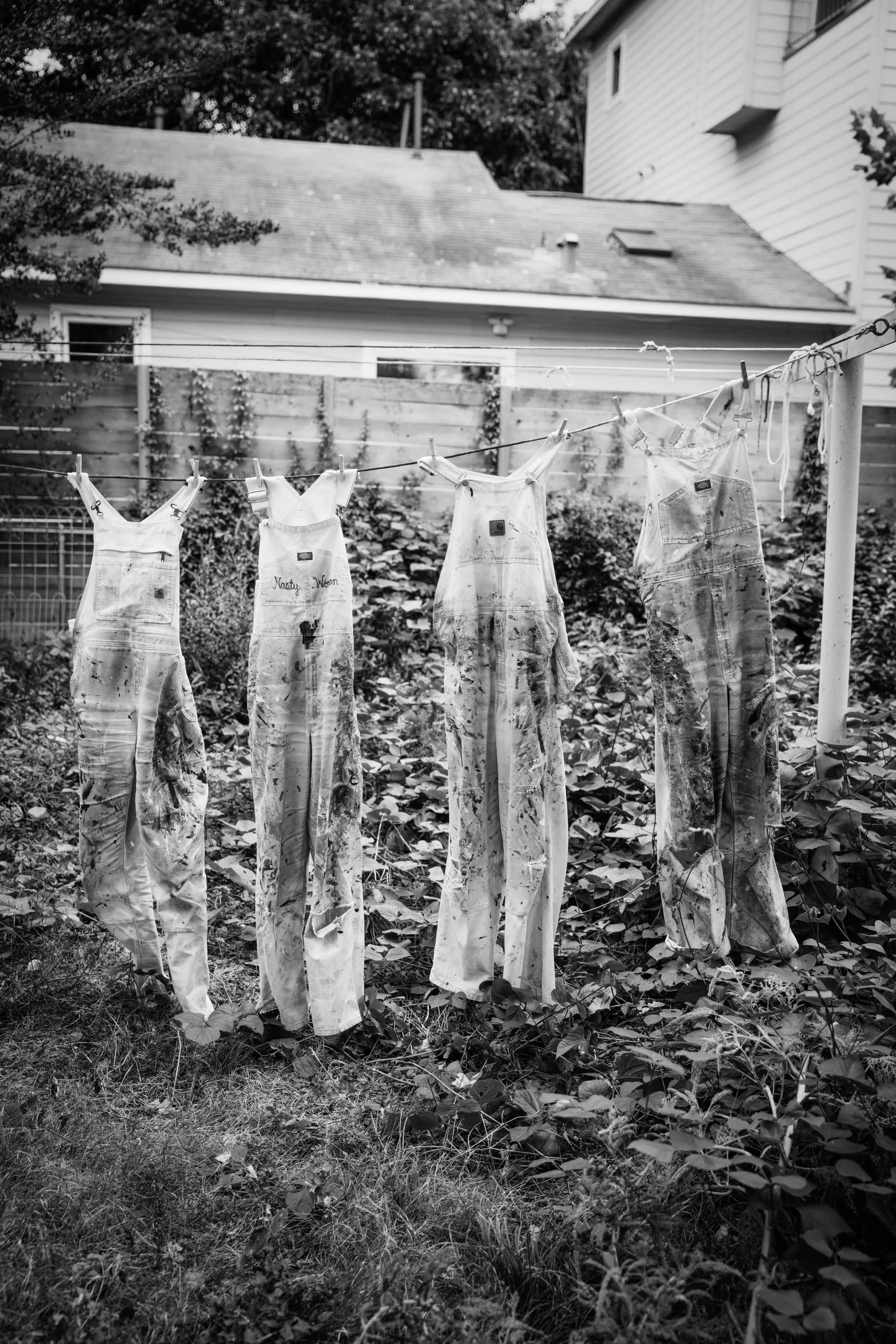 Painter-Overalls-on-Clothesline-in-Black-and-White.jpg