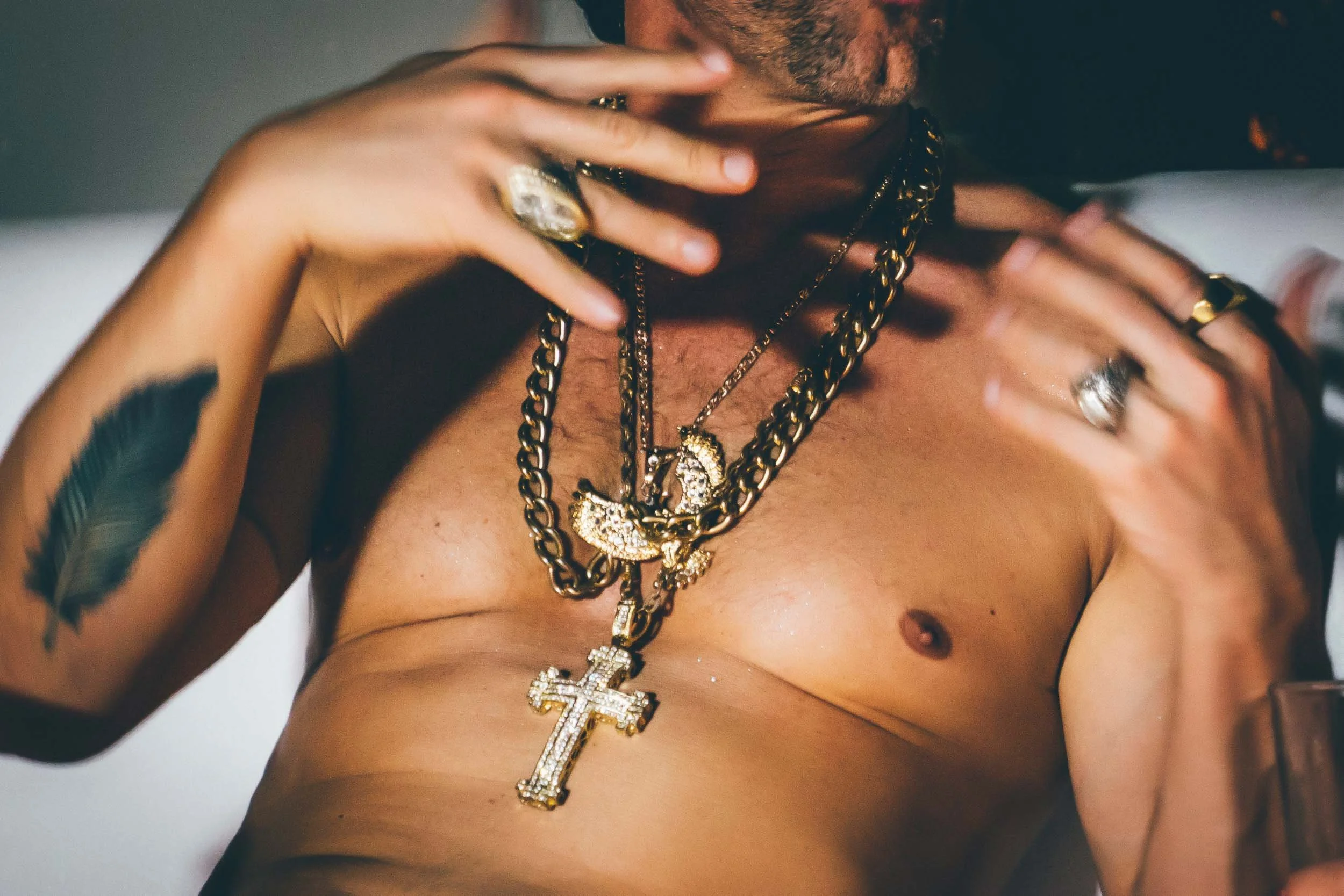 Shirtless-Man-Wearing-Gold-Necklaces.jpg