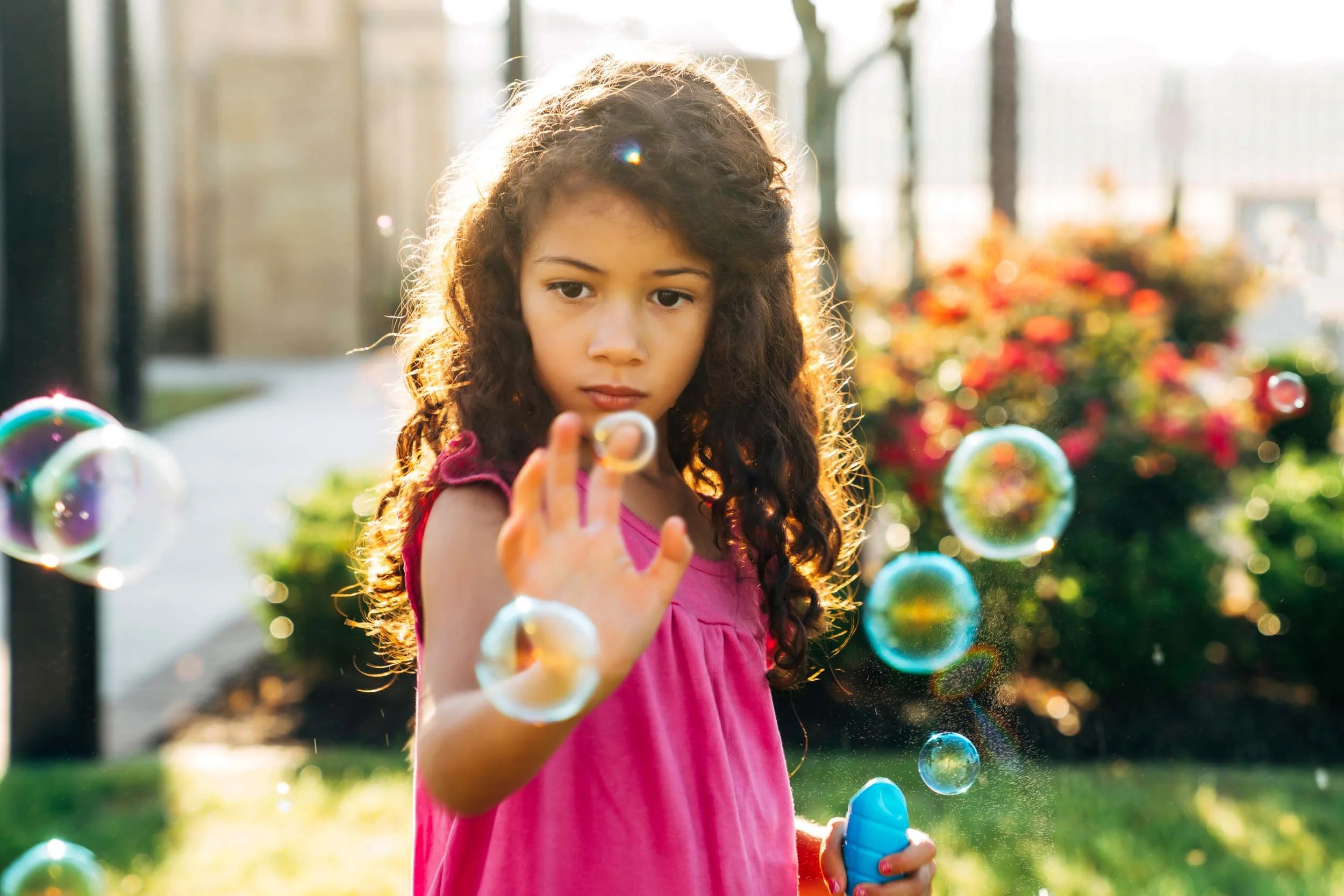 Girl-Playing-with-Bubbles.jpg