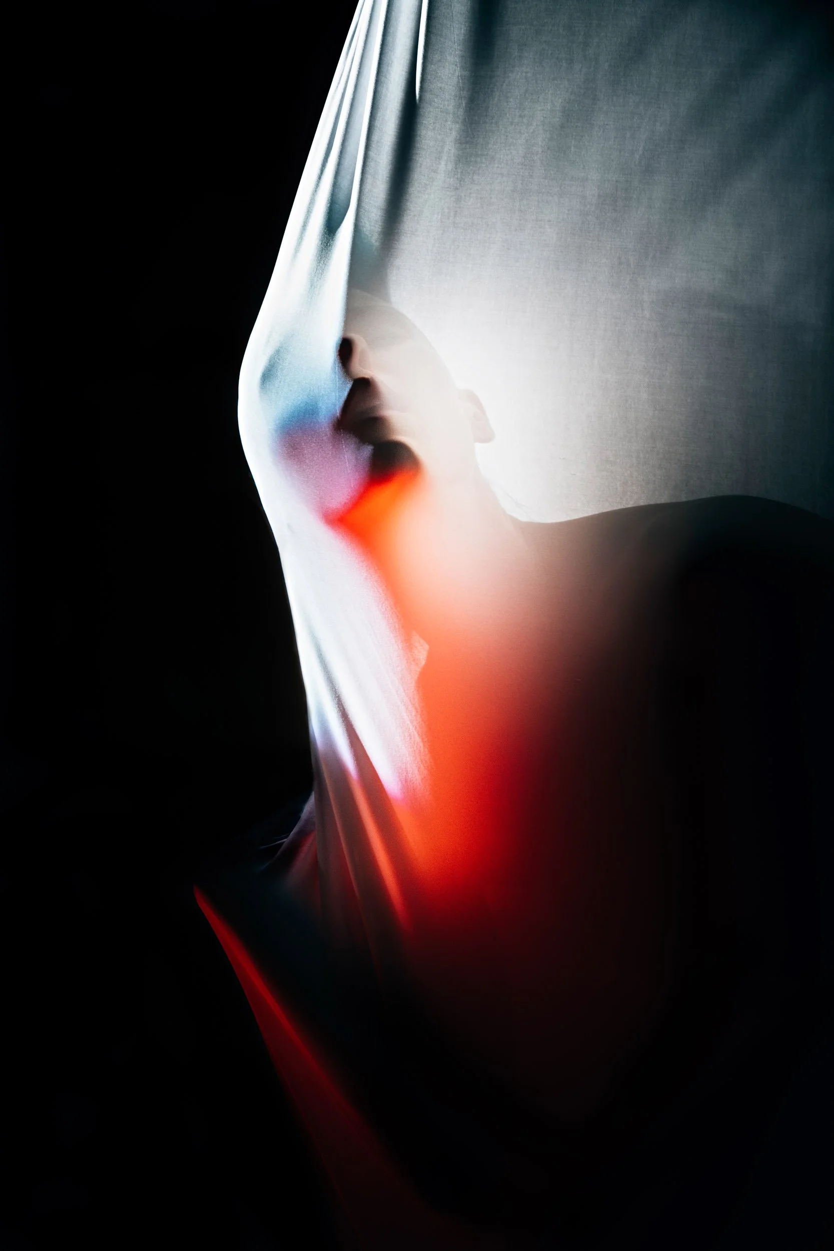 Silhouette-Face-Through-Lit-Cloth.jpg