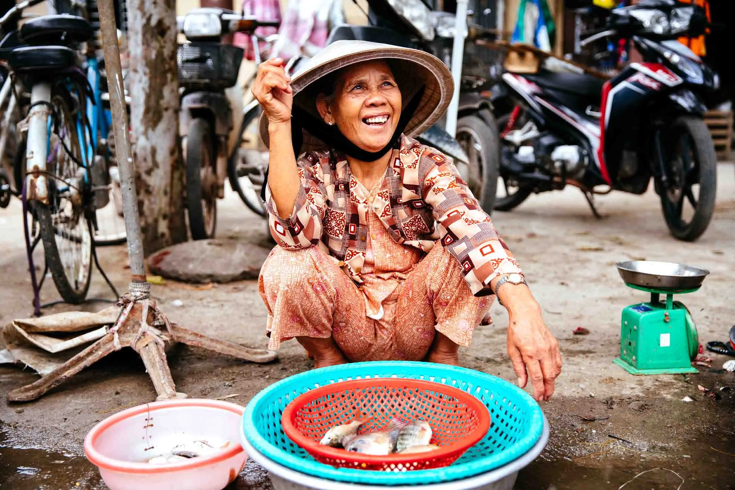 Female-Market-Vendor-with-Fish.jpg