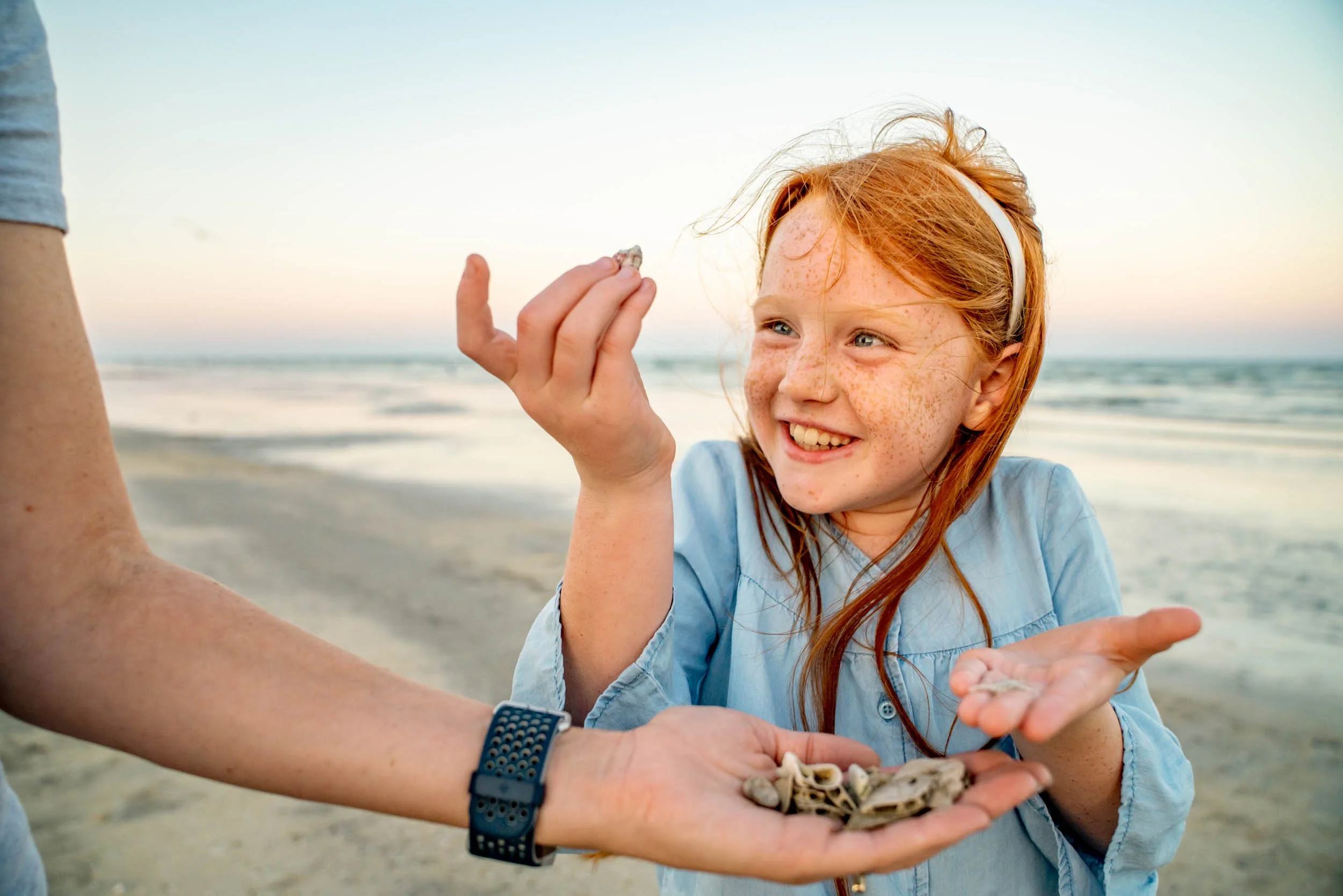 Girl-Finding-Seashells-at-Beach.jpg