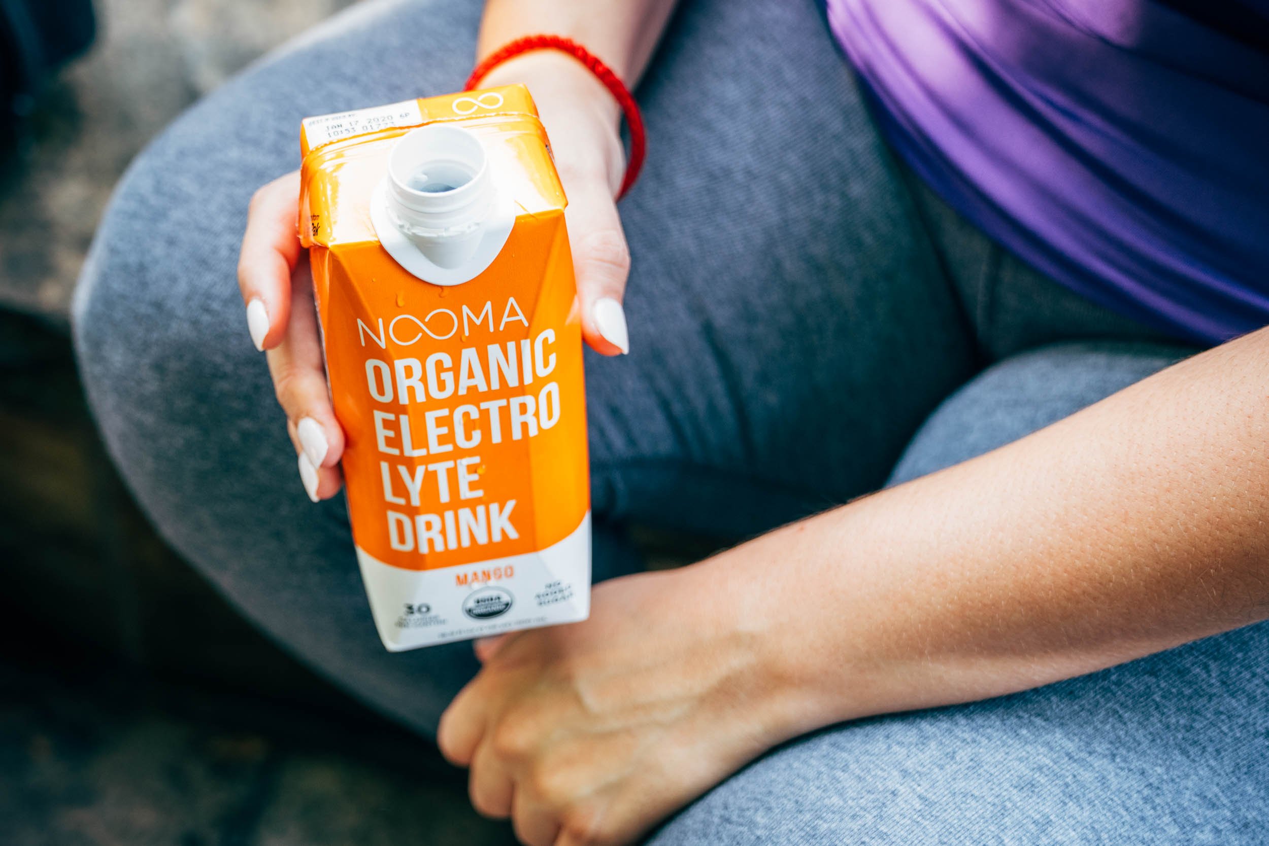 Hand-Holding-Nooma_Electrolyte-Drink.jpg