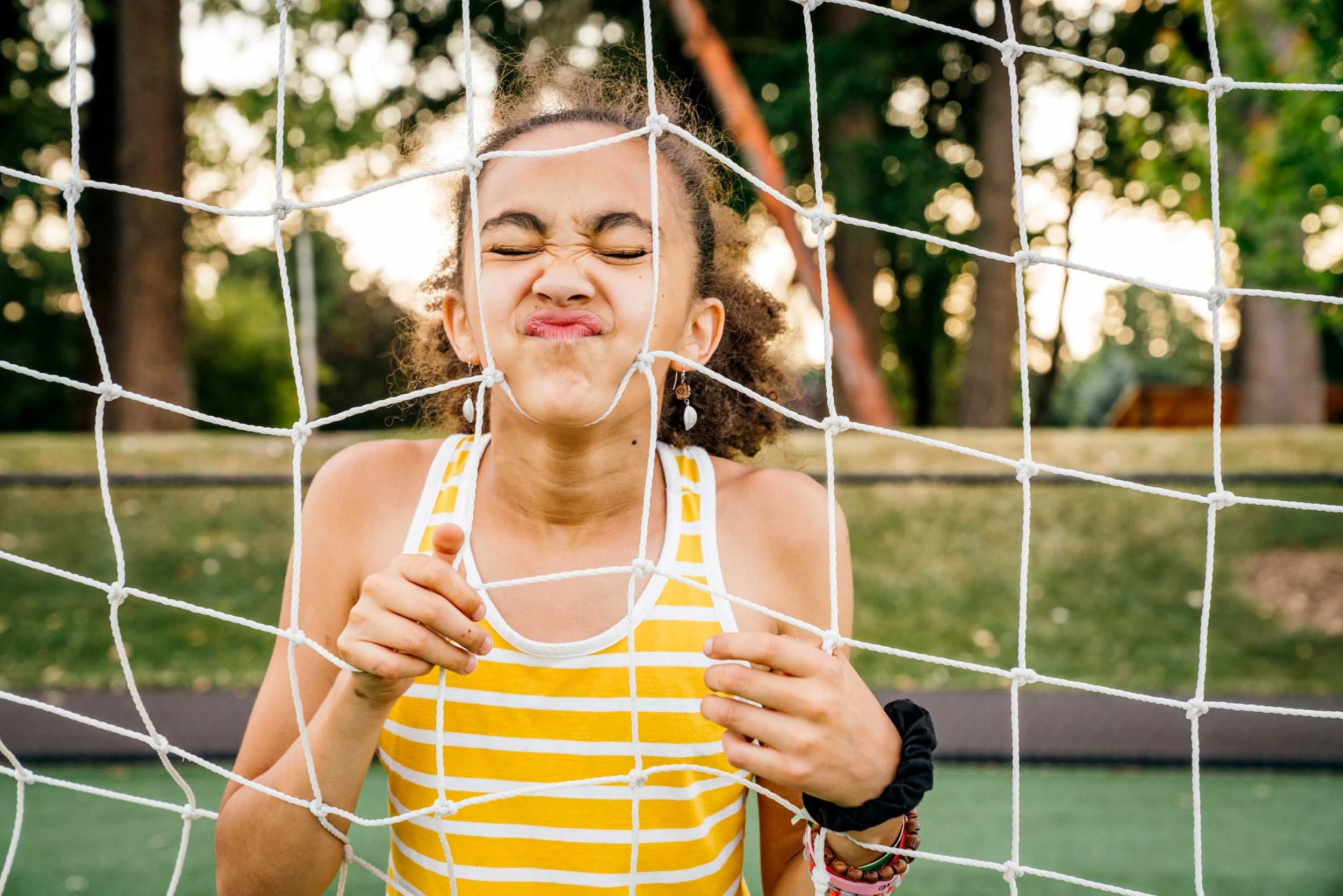 Girl-Playing-with-Soccer-Net.jpg