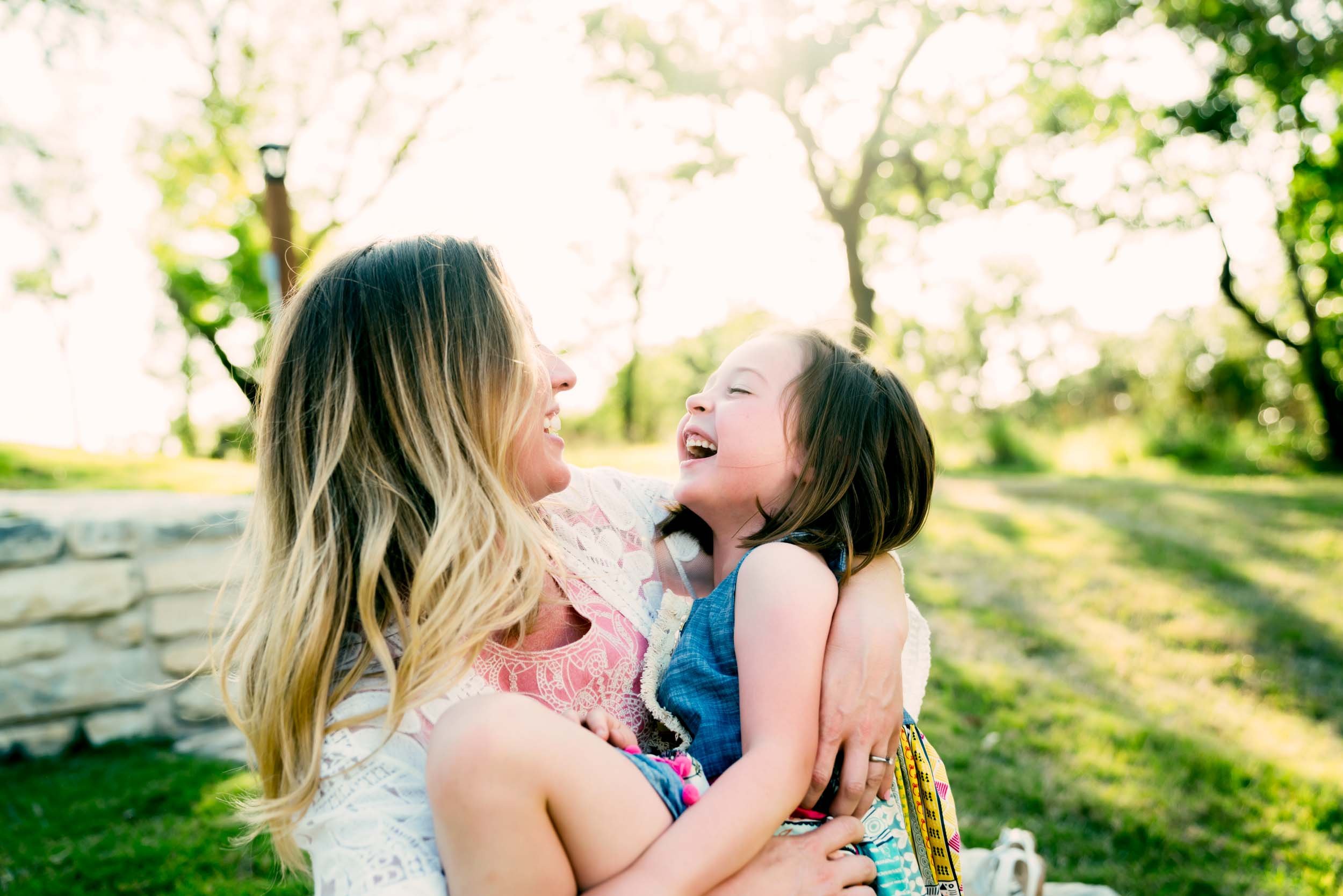 Mother-and-Daughter-Laughing-Outdoors.jpg