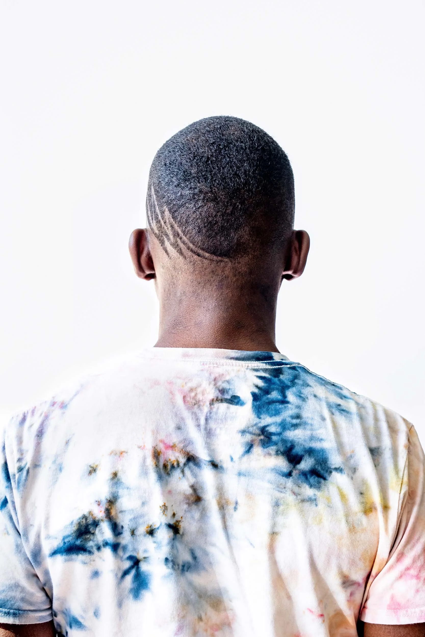 Back-View-of-Tie-Dye-Shirt-Shaved-Head_Mo.jpg