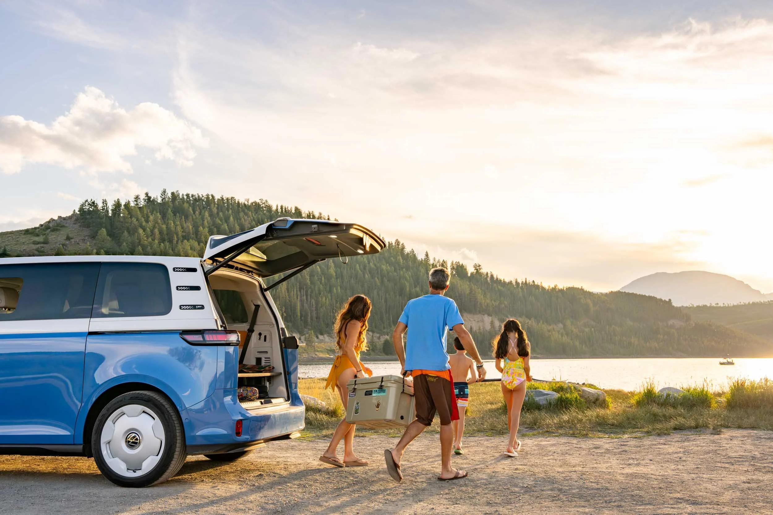 Family-Unloading-Cooler-From-Van-by-Lake.jpg