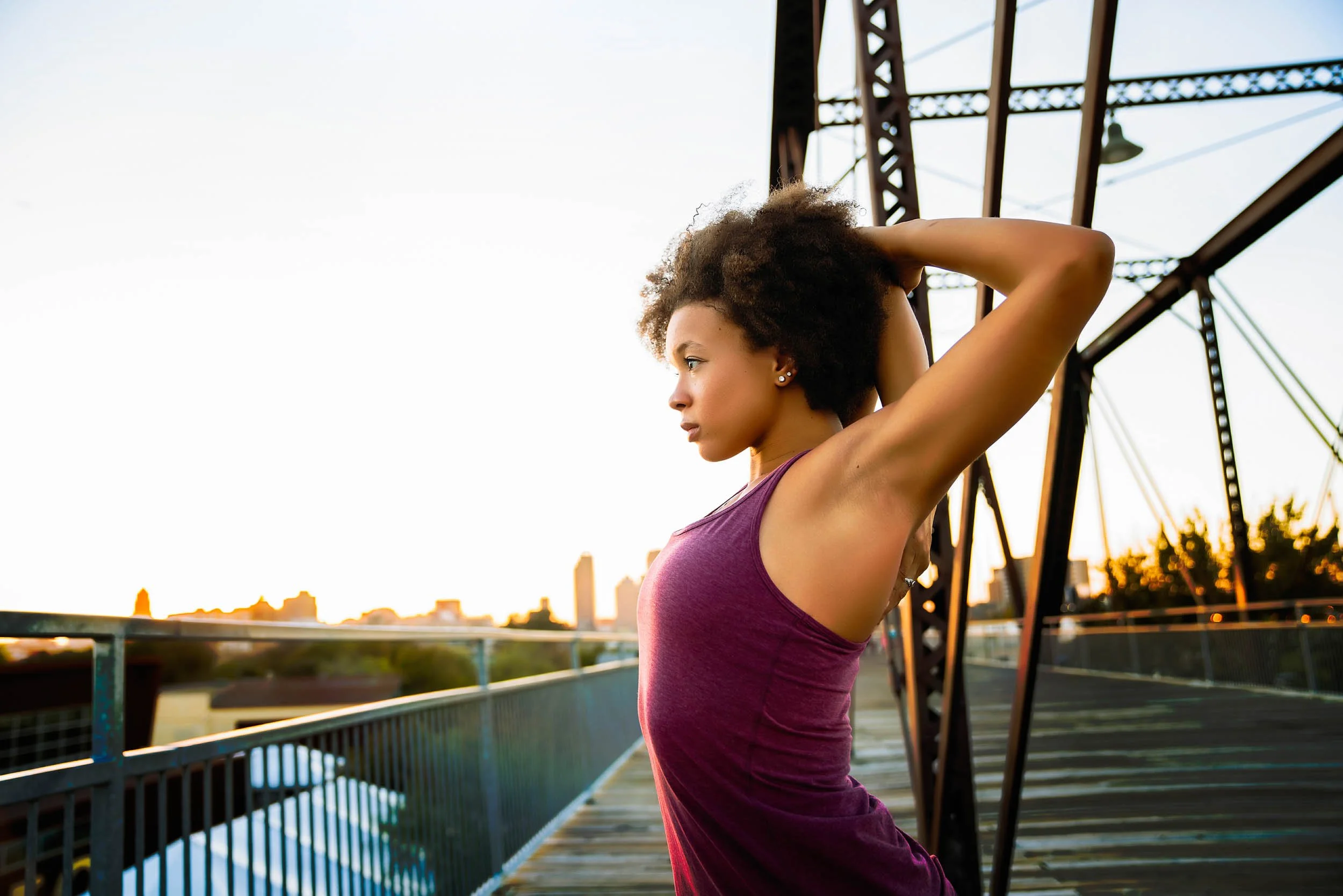 Woman-stretching-on-bridge.jpg