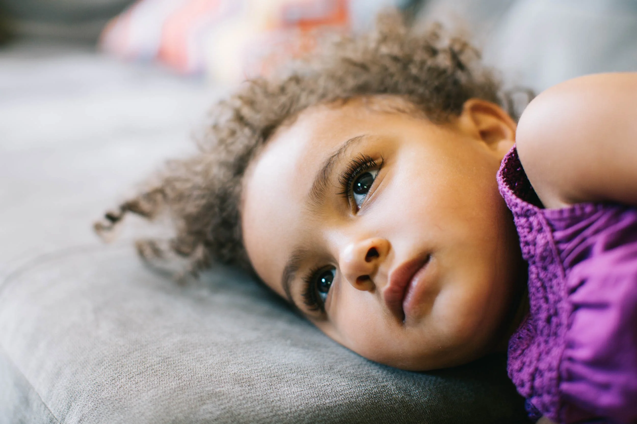 Close-up-of-girl-on-couch.jpg