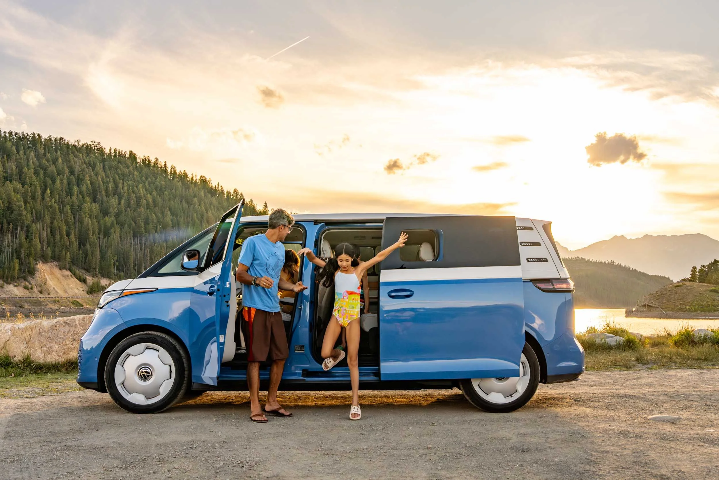 Family-Getting-Out-of-Volkswagon-ID-Buzz-by-Lake.jpg