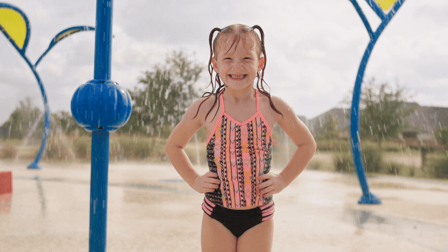 Smiling-Girl-At-Water-Park.gif