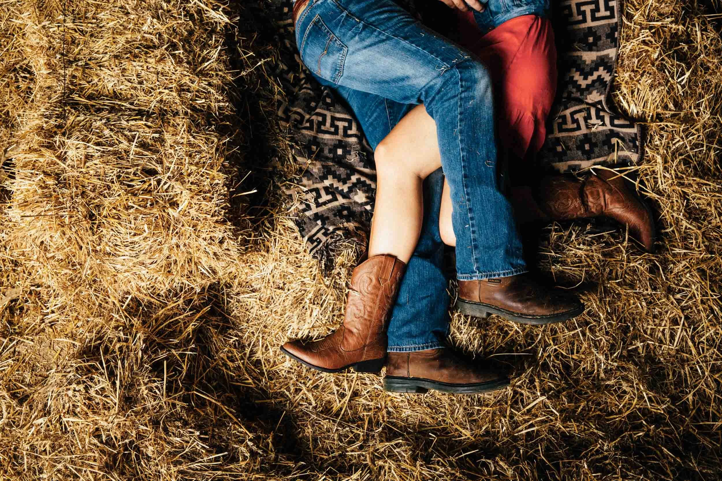 Entwined-legs-of-couple-in-hay.jpg