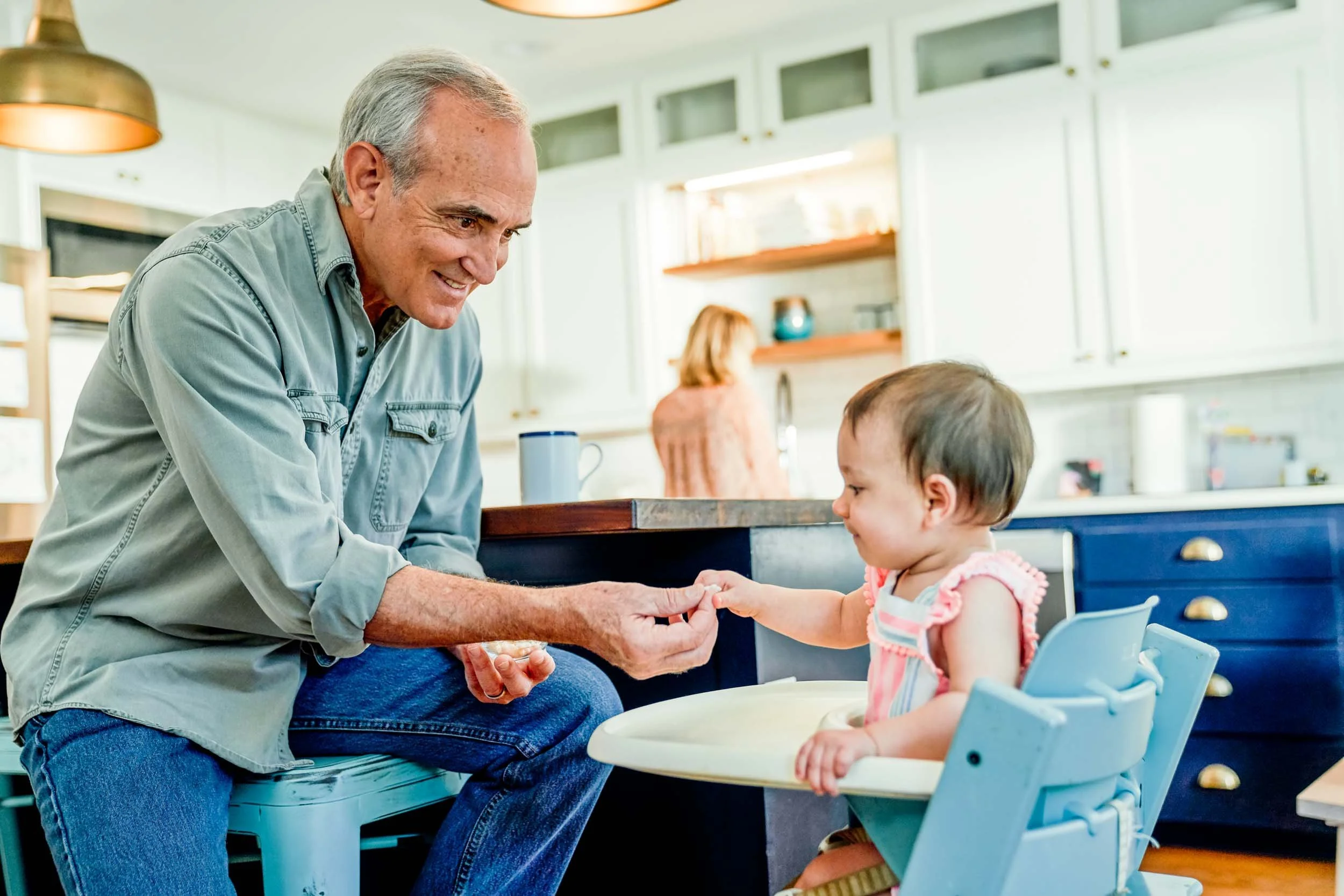 Man-feeding-baby-in-Kitchen.jpg