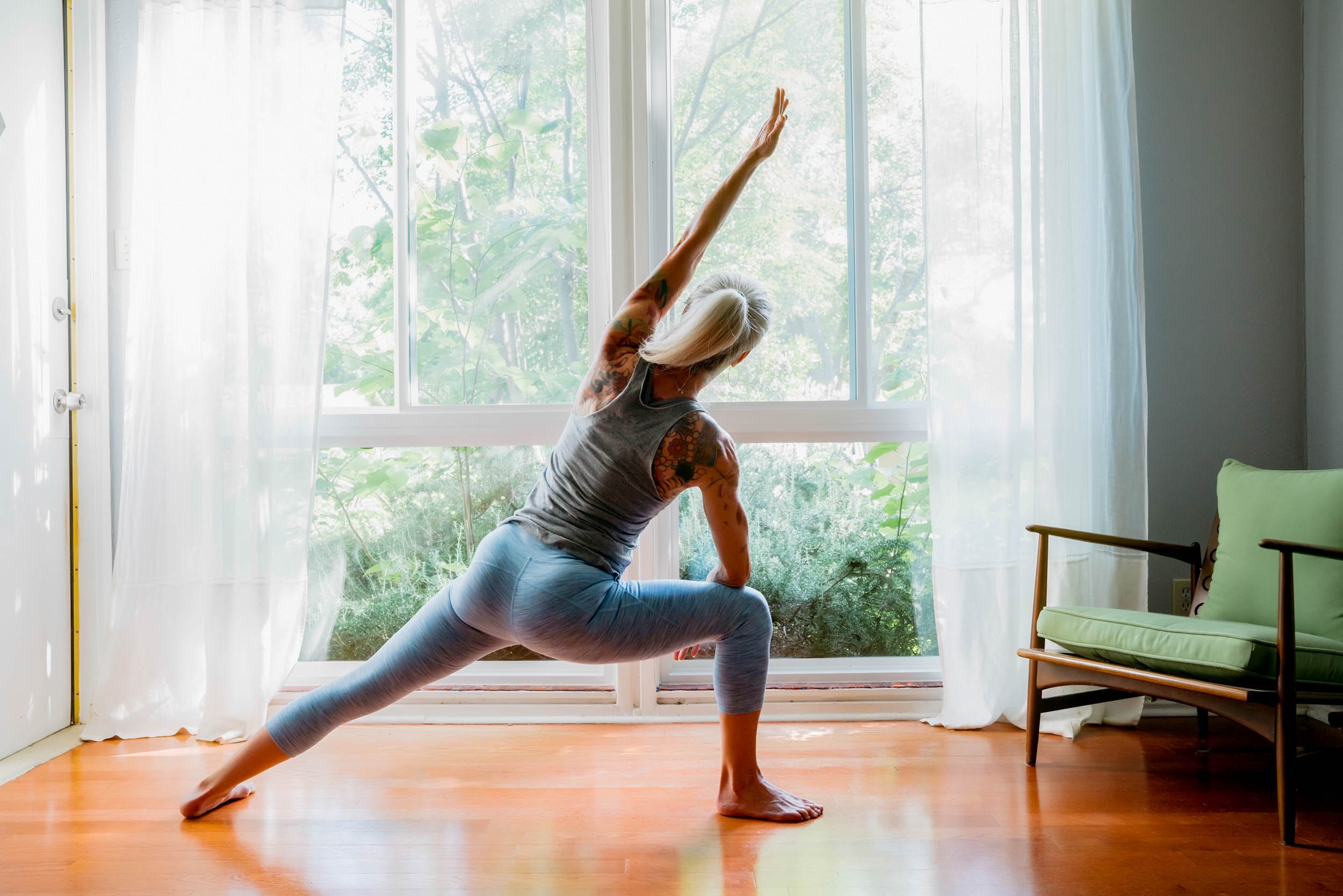 Woman-Practicing-Yoga-at-Home.jpg