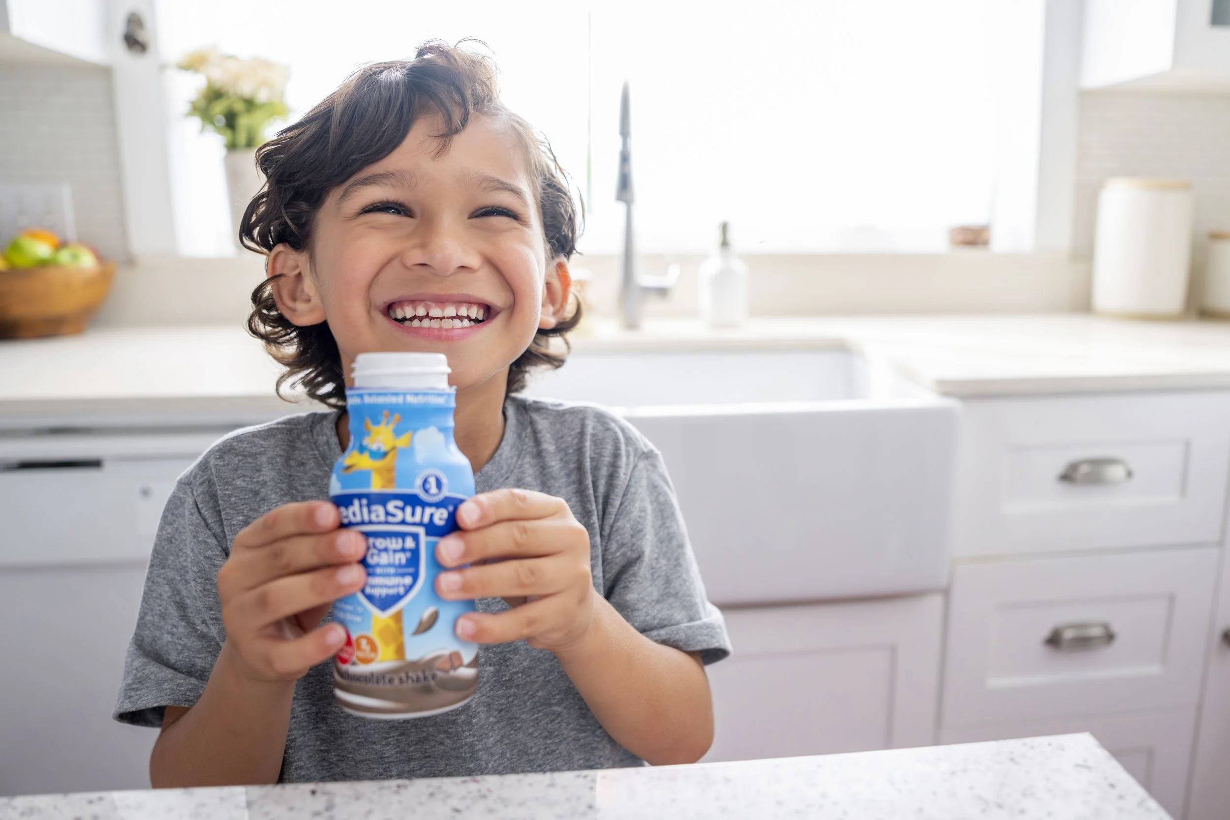 Smiling-Child-with-PediaSure-Chocolate-Drink.JPG