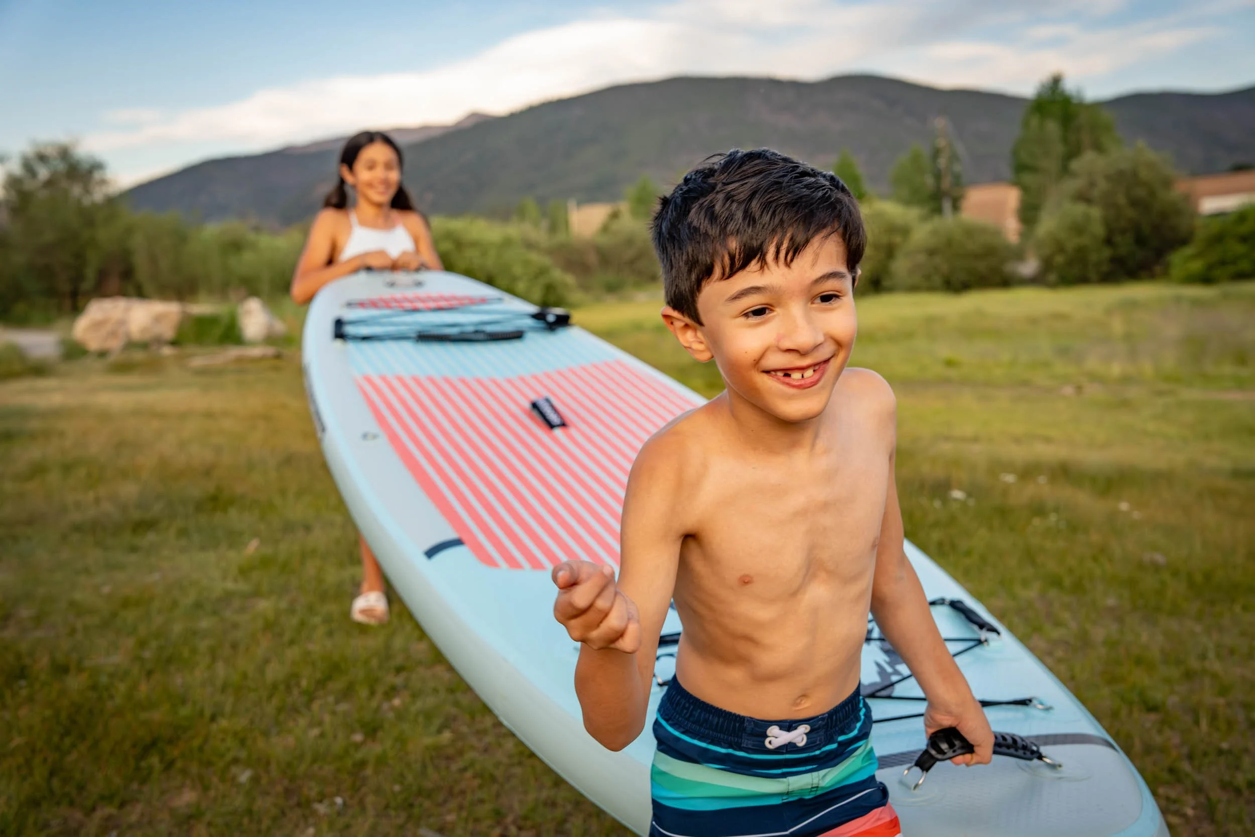 Children-Carrying-Paddleboard.jpg