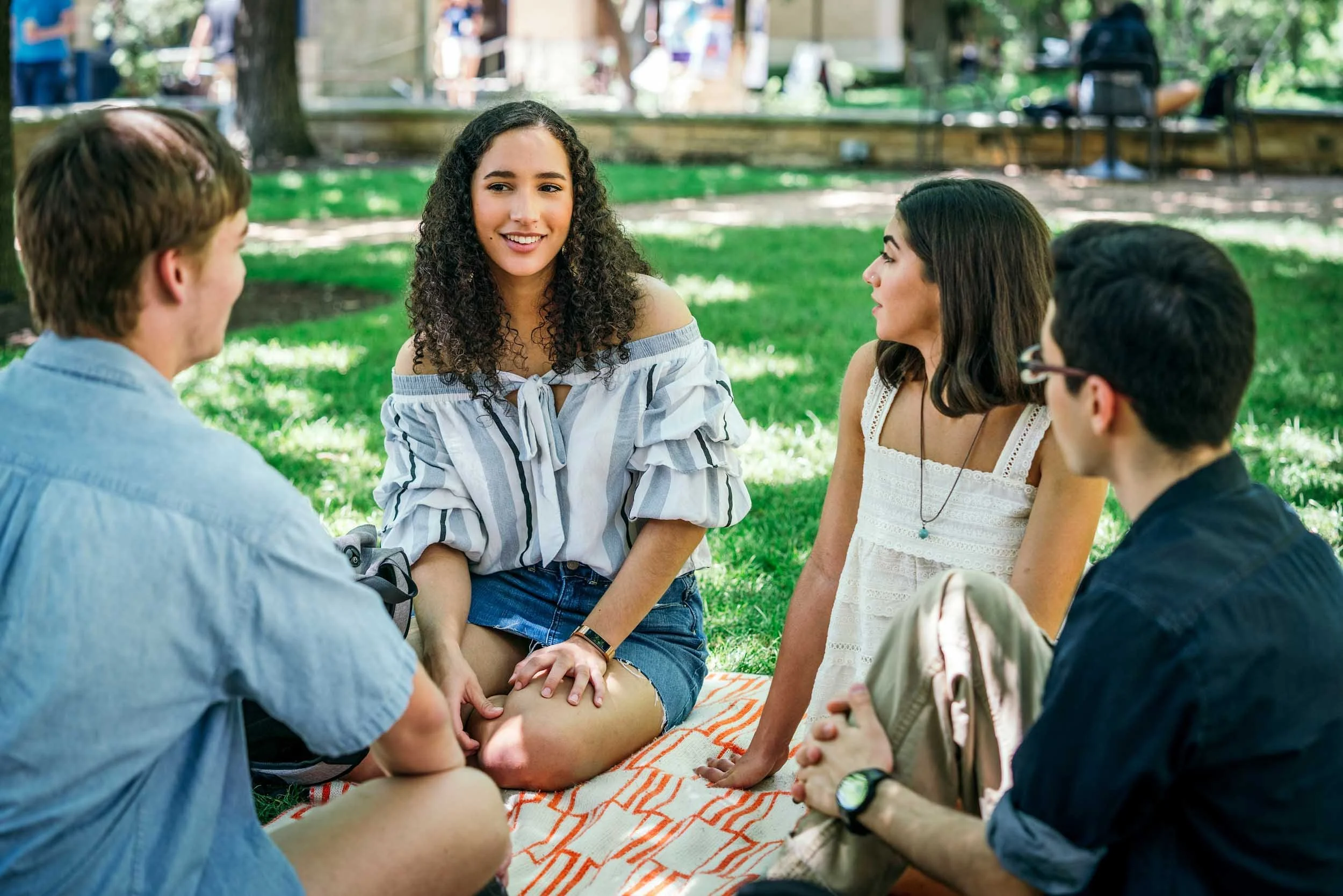 College-Students-Gathered-on-Campus-Lawn.jpg