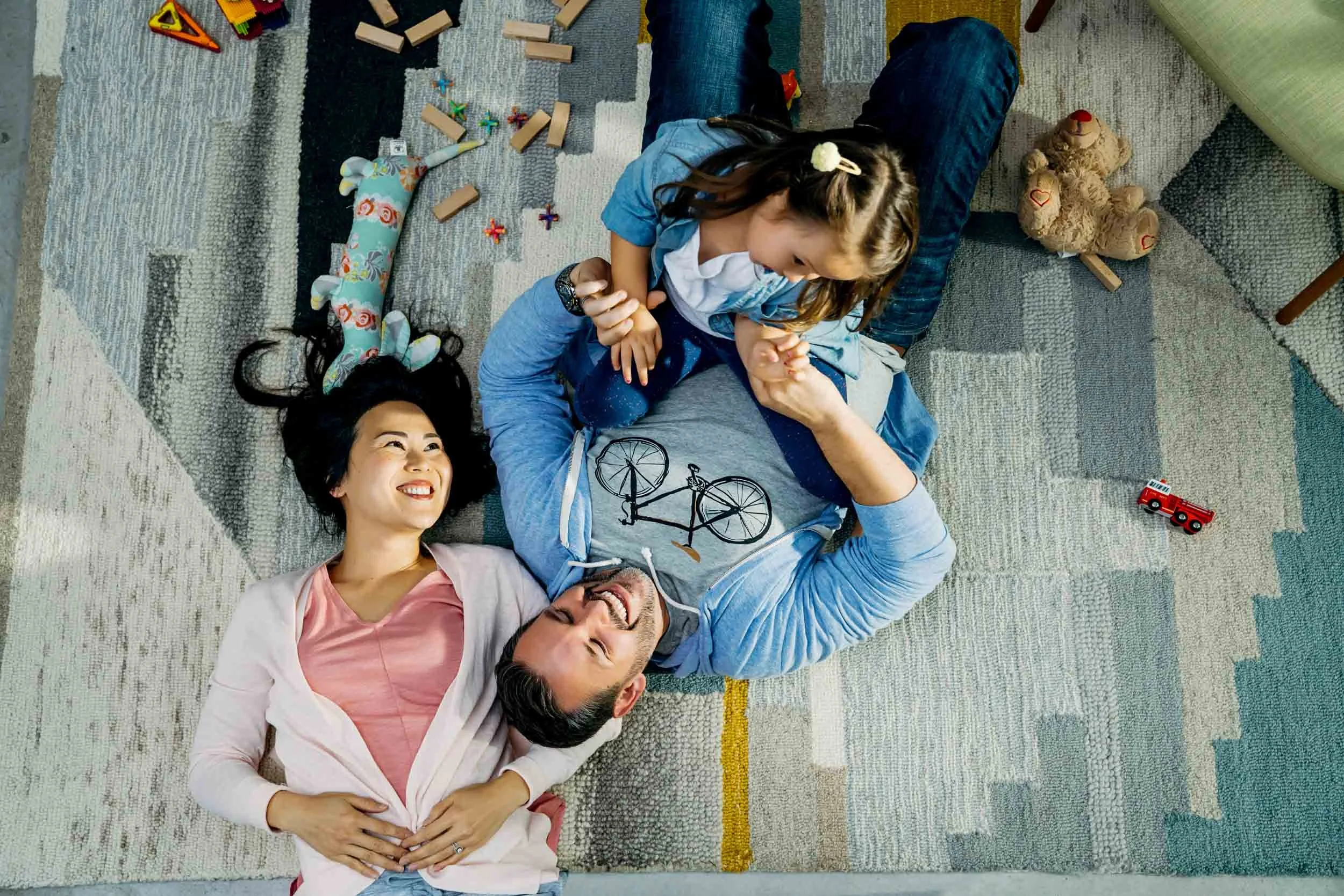 Family-playing-together-on-floor.jpg