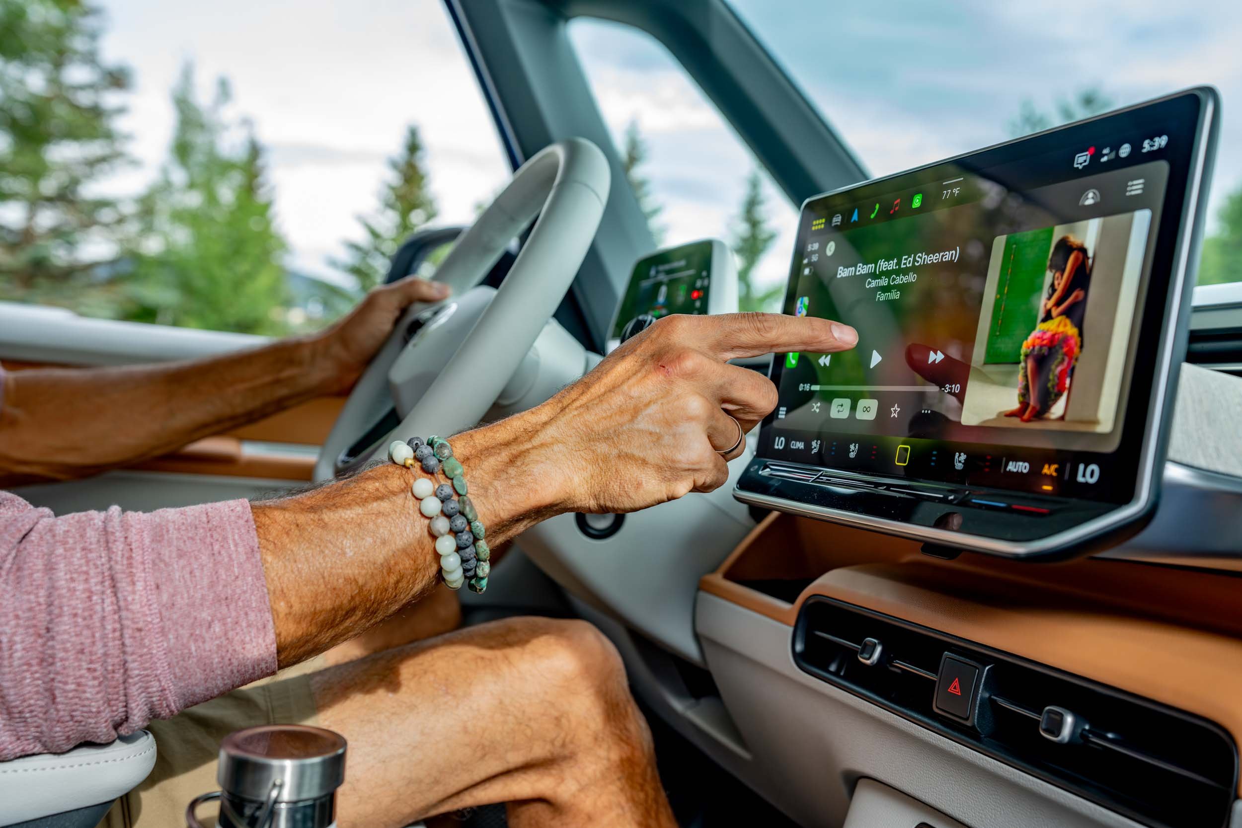 Man-Using-Car-Touchscreen-System.jpg