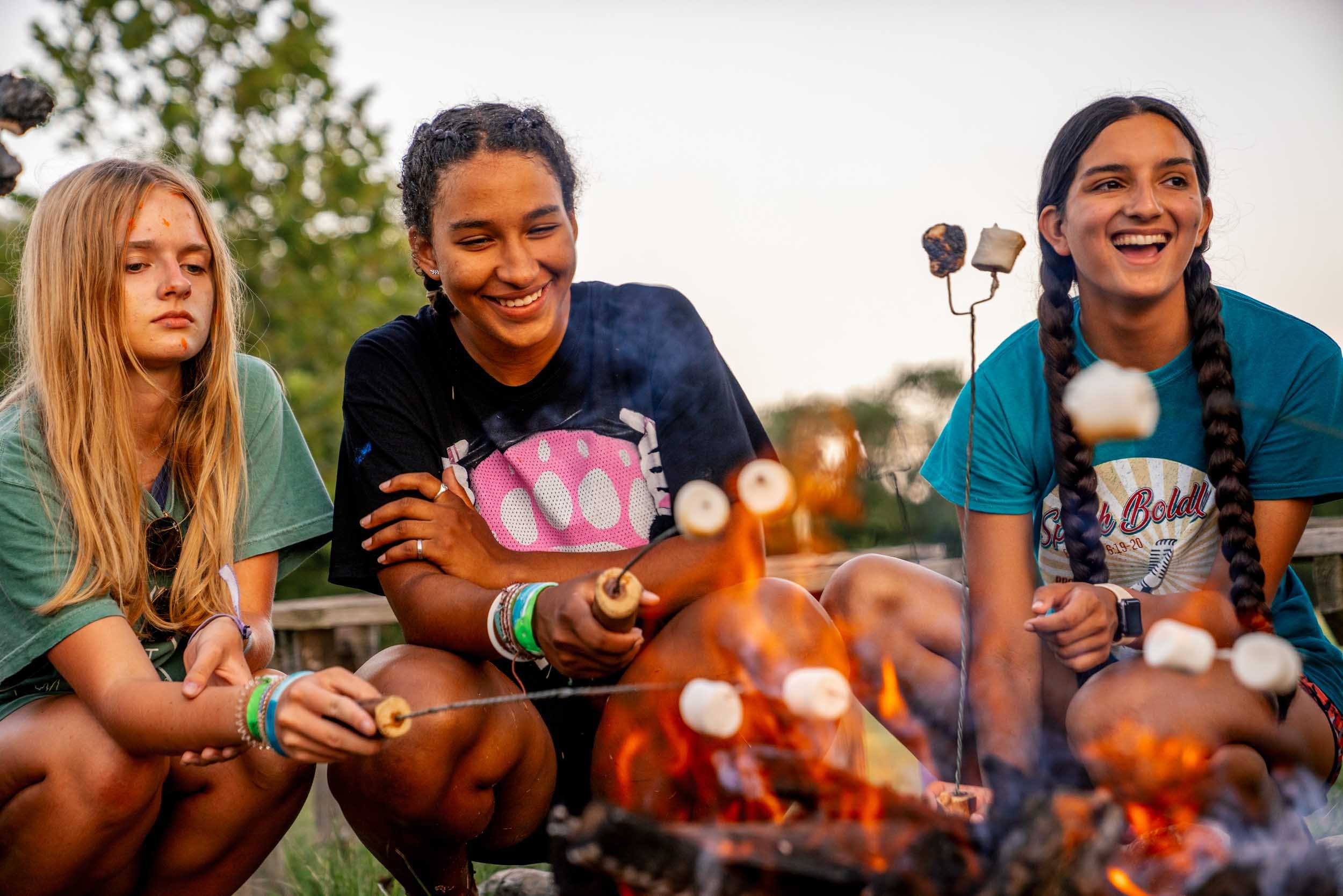 Teen-Girls-at-Campfire-Roasting-Marshmallows.jpg