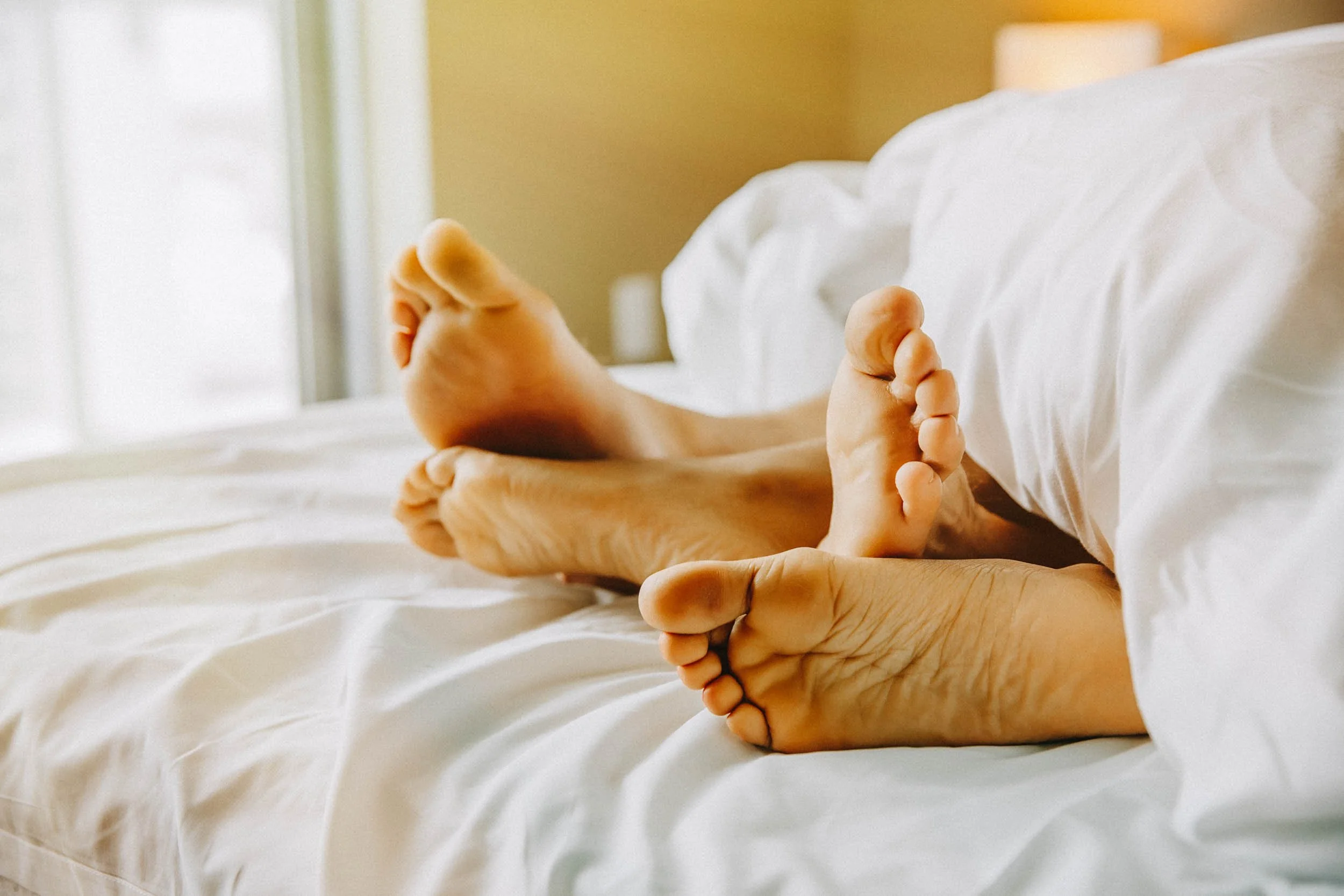 Couples-Feet-in-Bed.jpg