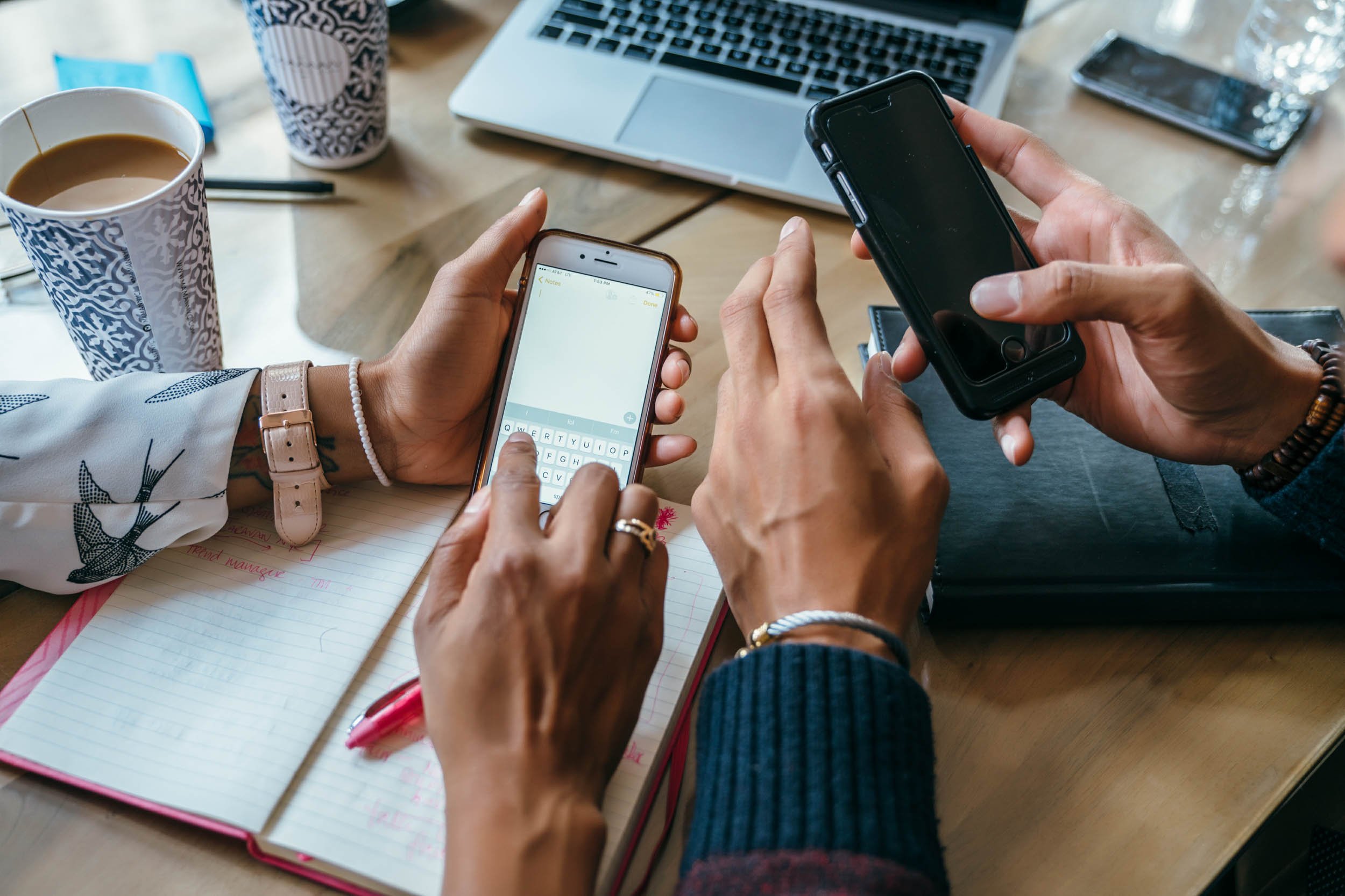 Close-up-Hands-Holding- Cell-Phones.jpg