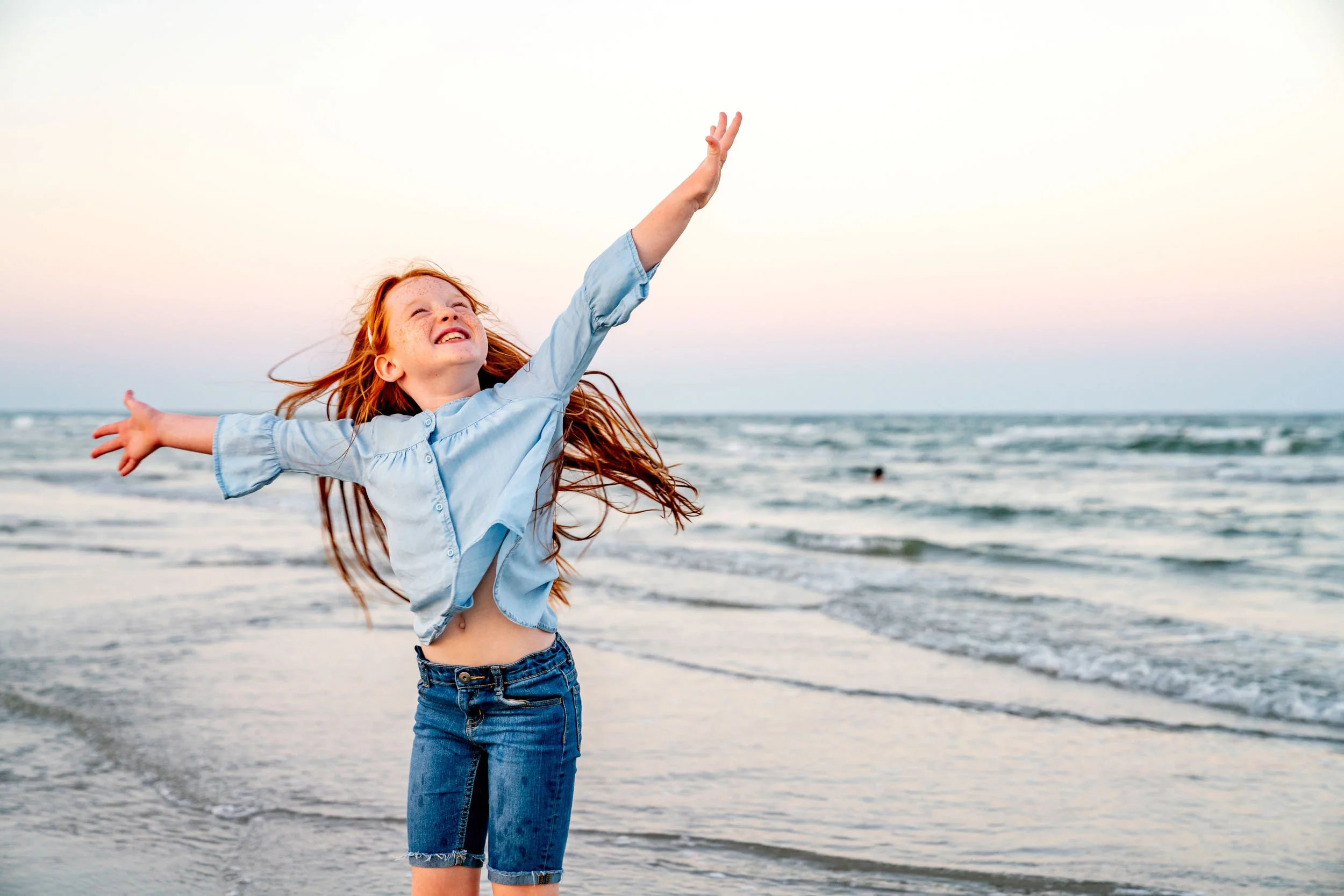 Girl-Dancing-on-Beach.jpg