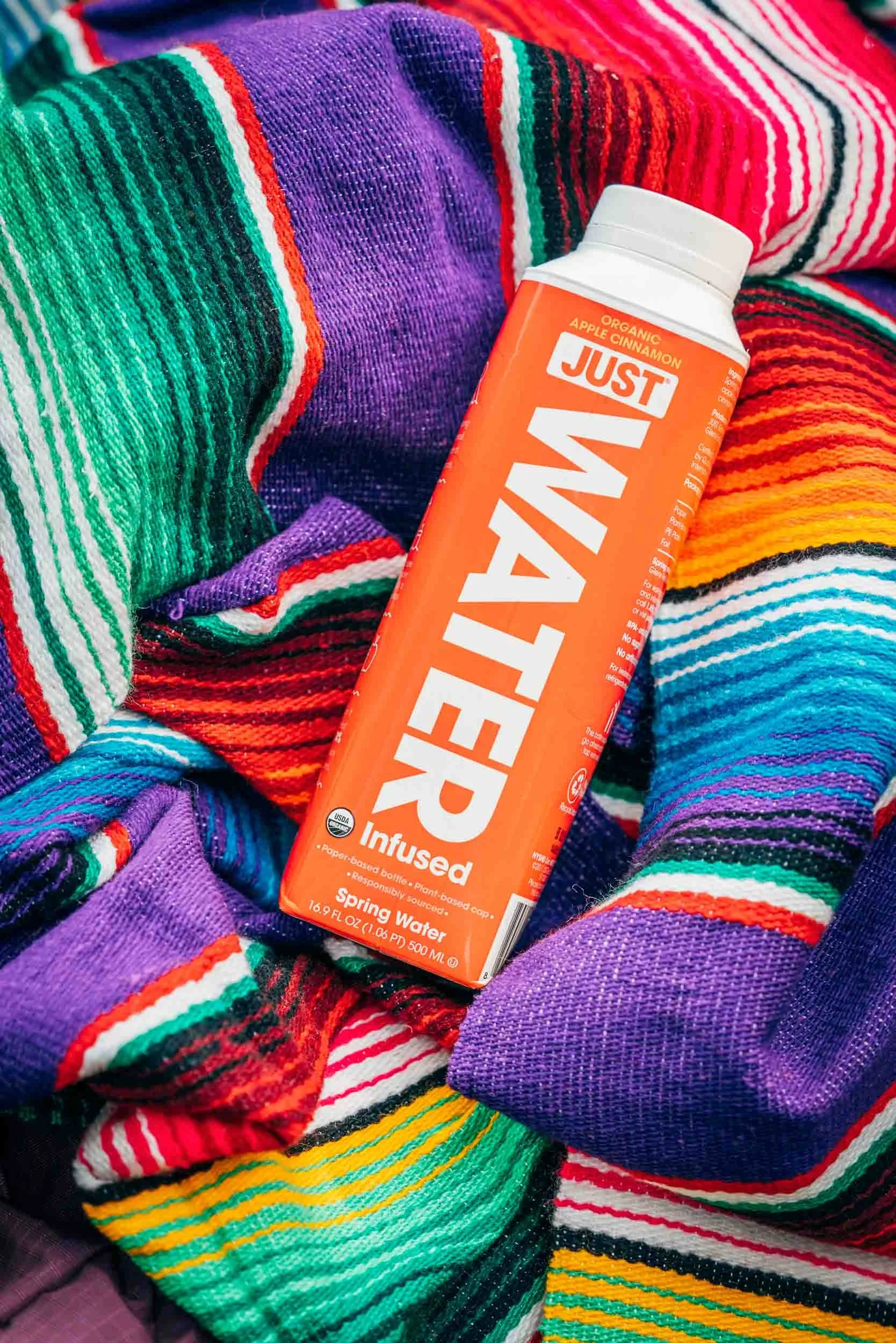 Just-Water-Box-on-Colorful-Blanket.jpg