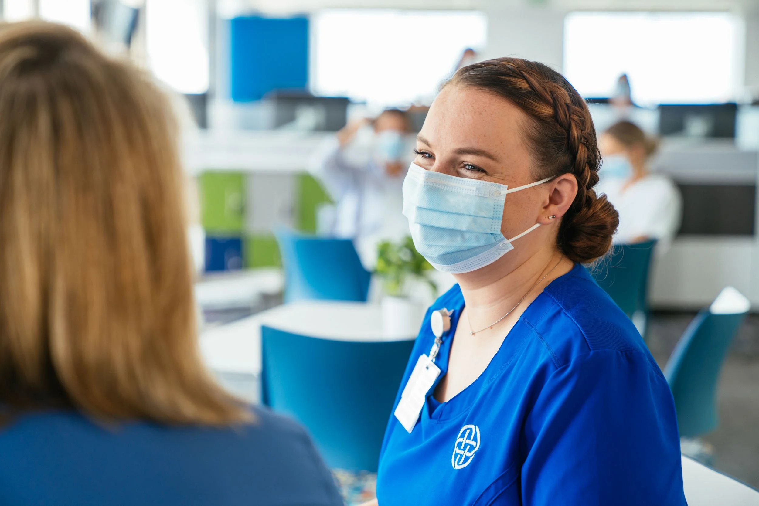 Smiling-nurse-with-mask.jpg