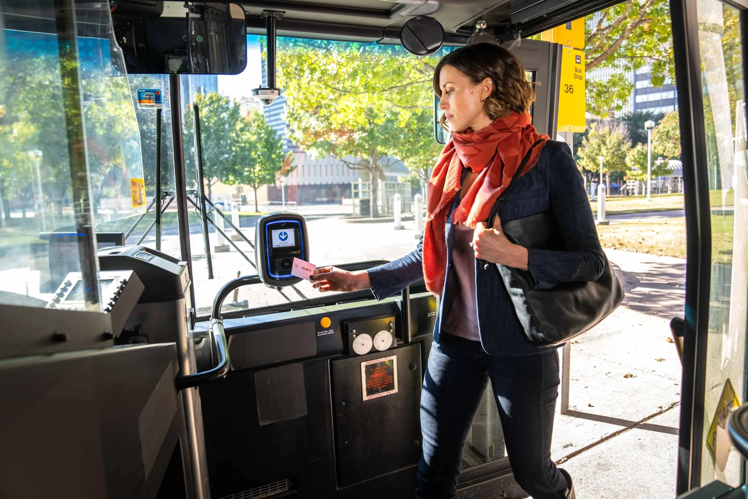Tapping-Discover-Card-to-Pay-on-Bus.jpg