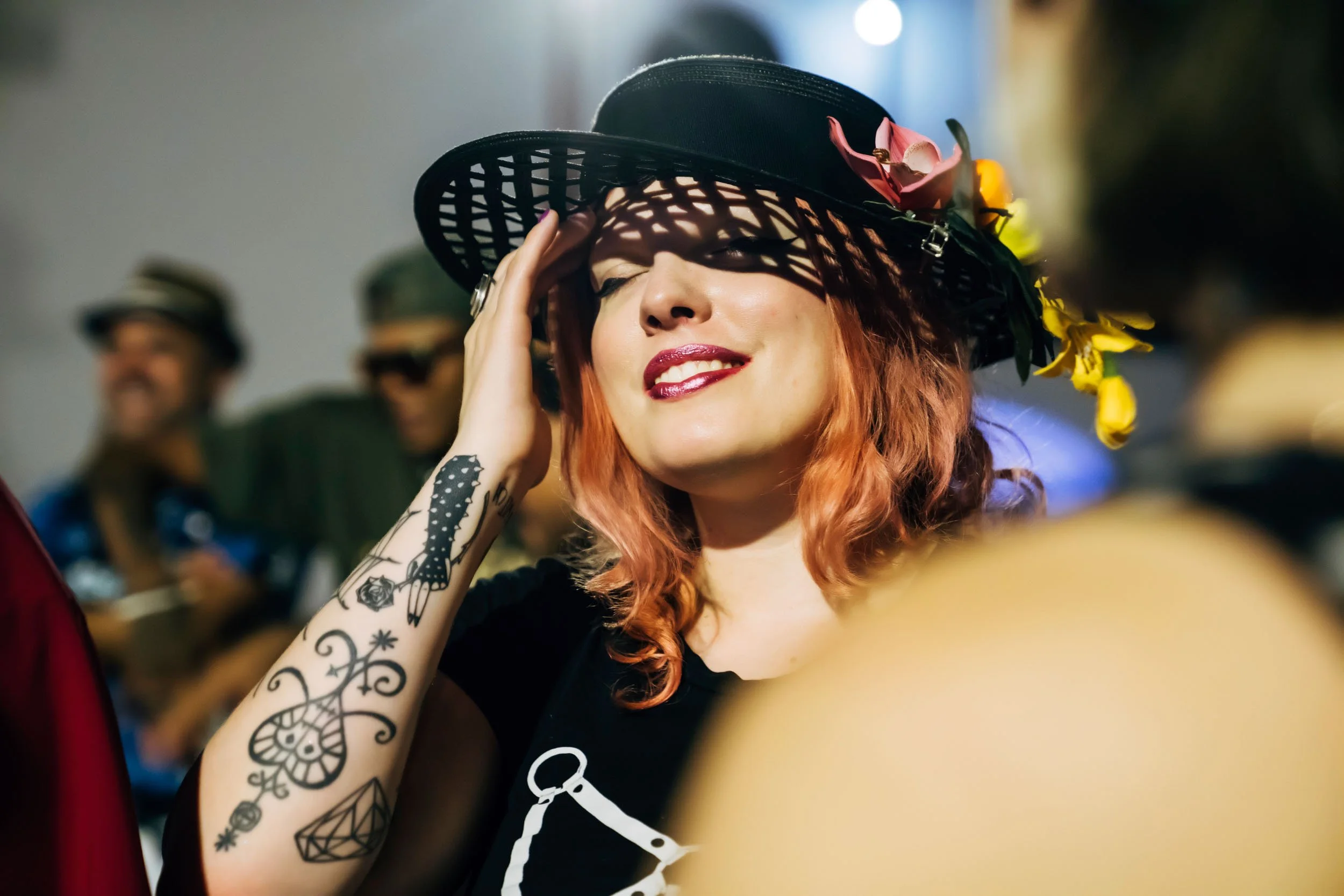 Woman-with-Decorative-Hat-and-Tattoo.jpg