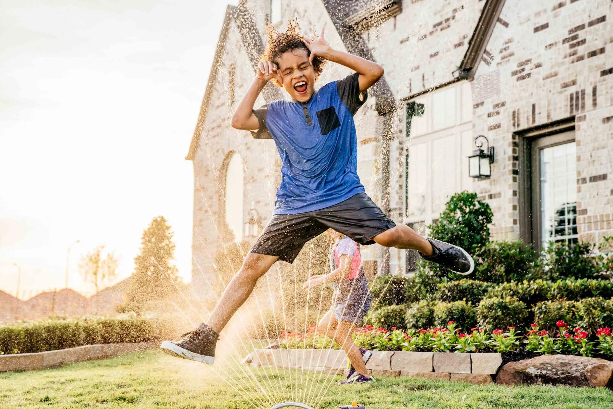 Boy-Jumping-in-Sprinkler.jpg