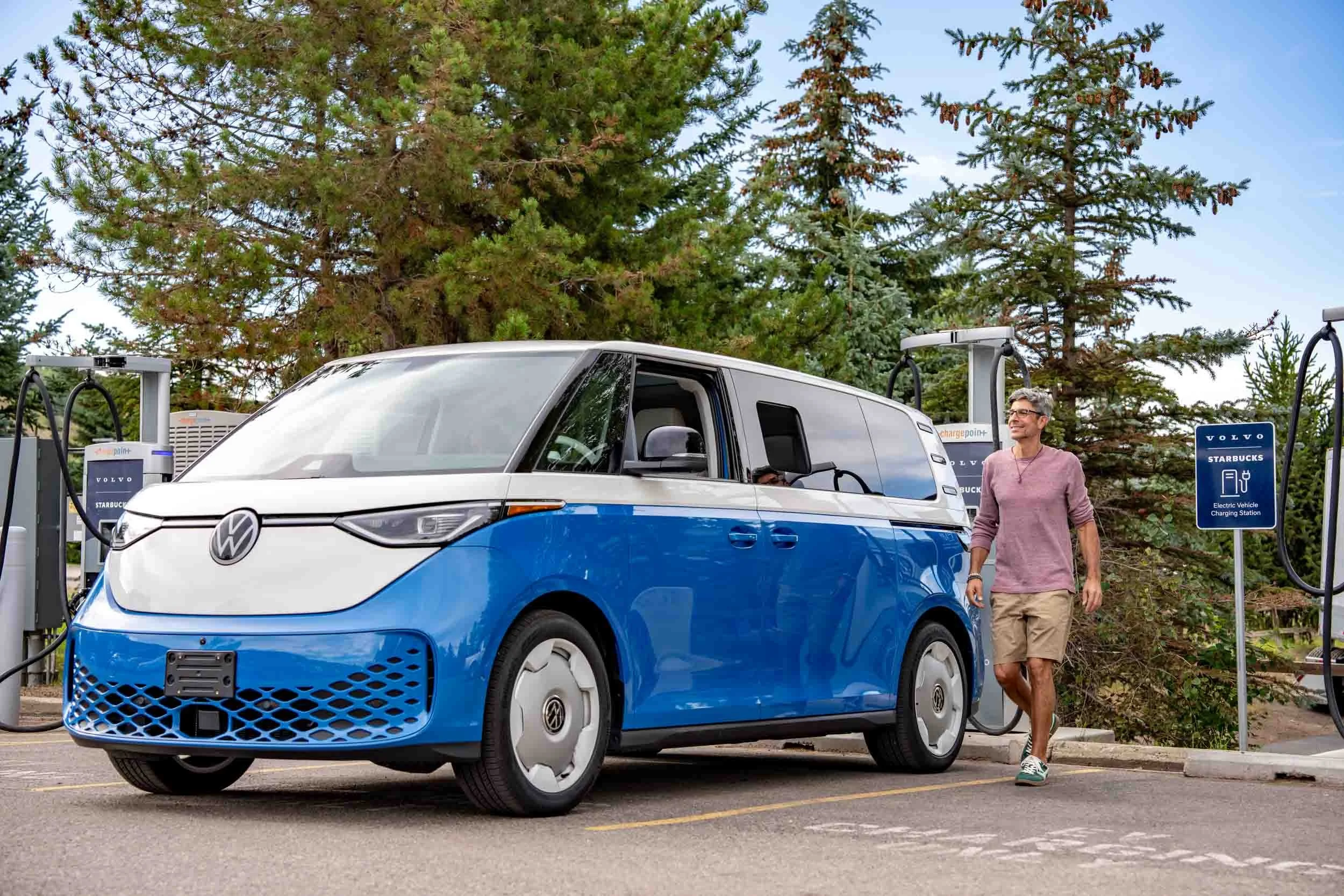 Man-with-Volkswagen-ID-Buzz-at-Charging-Station.jpg