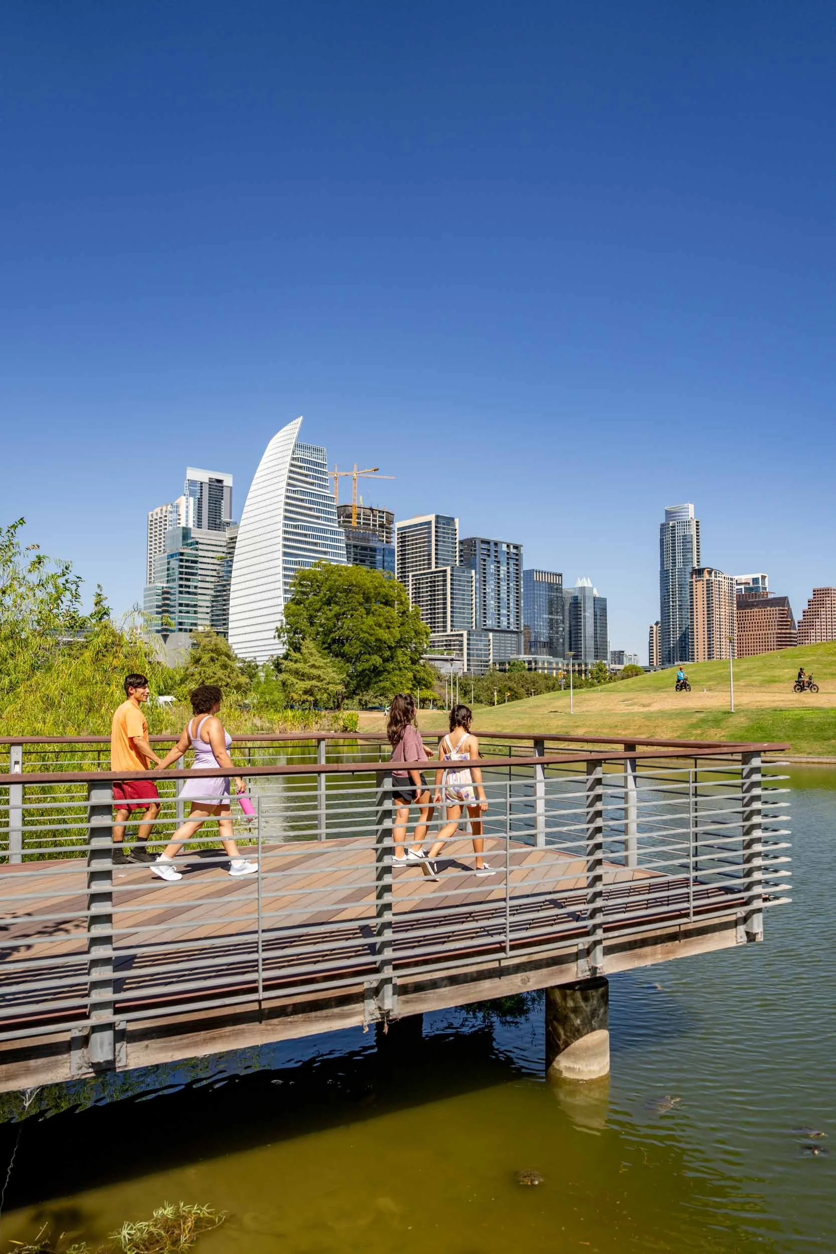 Family-Walking-on-Austin-City-Bridge.jpg