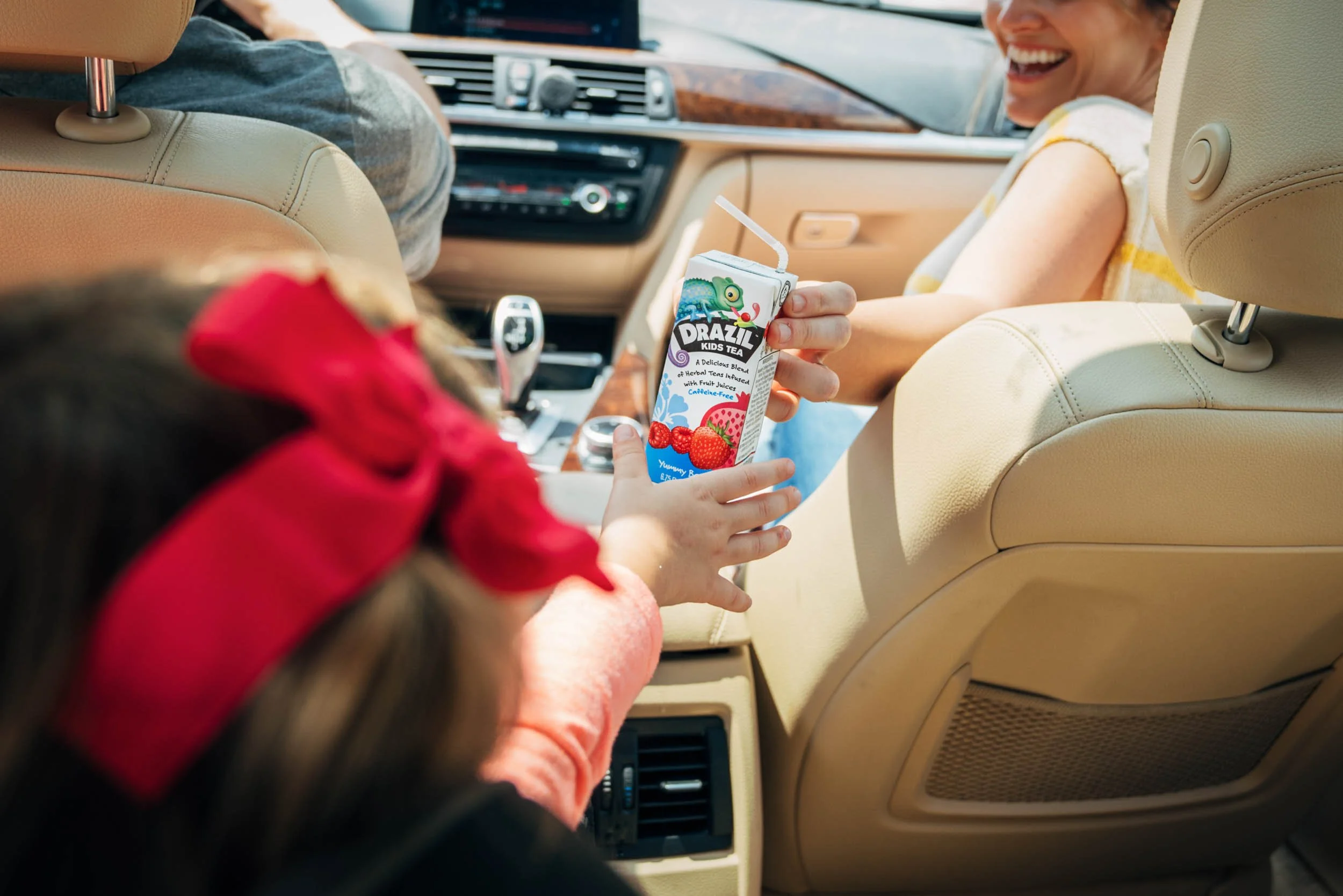 Passing-Juice-Box-in-Car.jpg