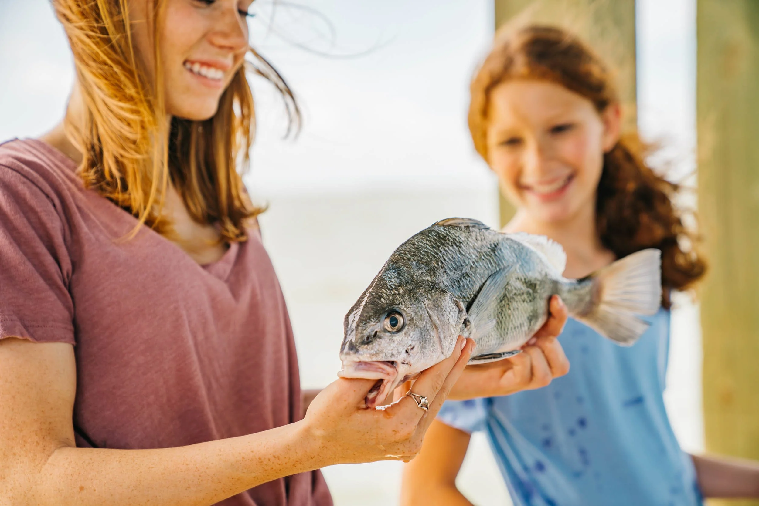 girl-holding-fish.jpg