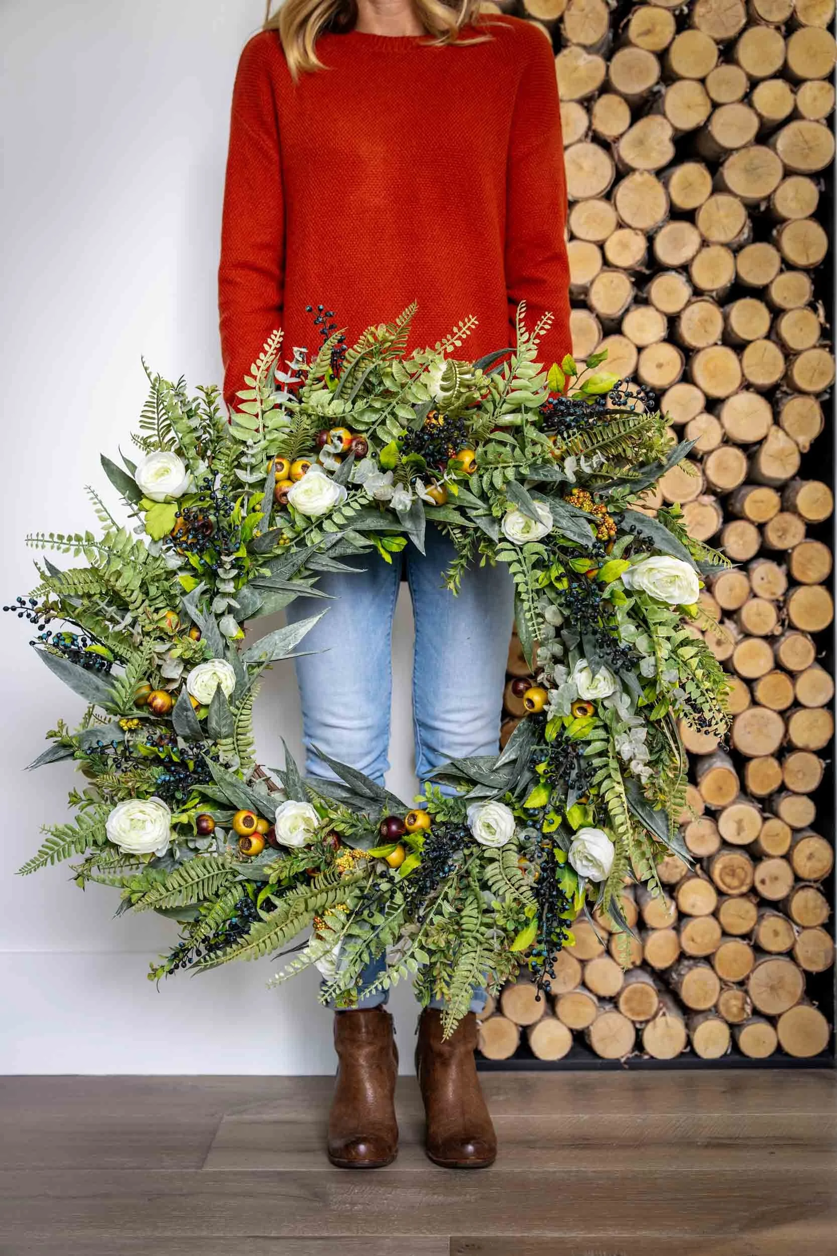 Woman-Holding-Decorative-Wreath.jpg