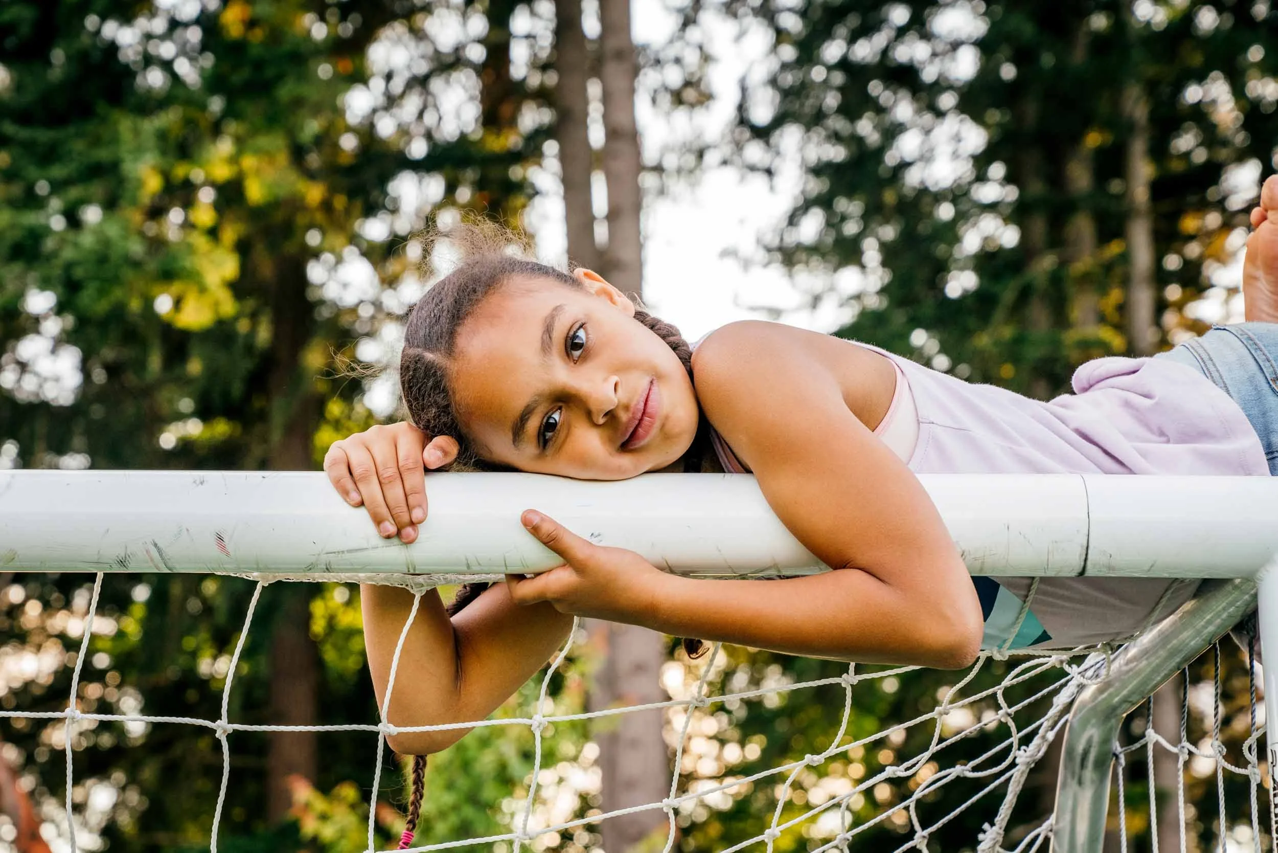 Girl-on-Soccer-Goal-Post.jpg
